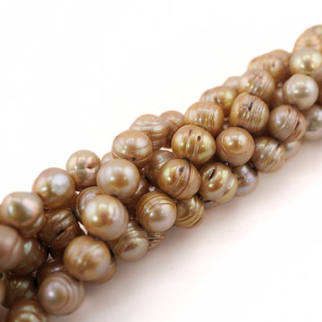11x9 MM golden pearls close-up