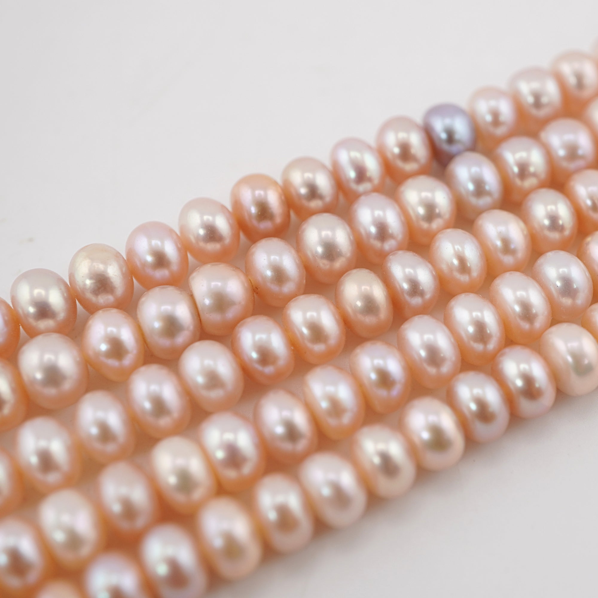 Near Round Peach Pearls