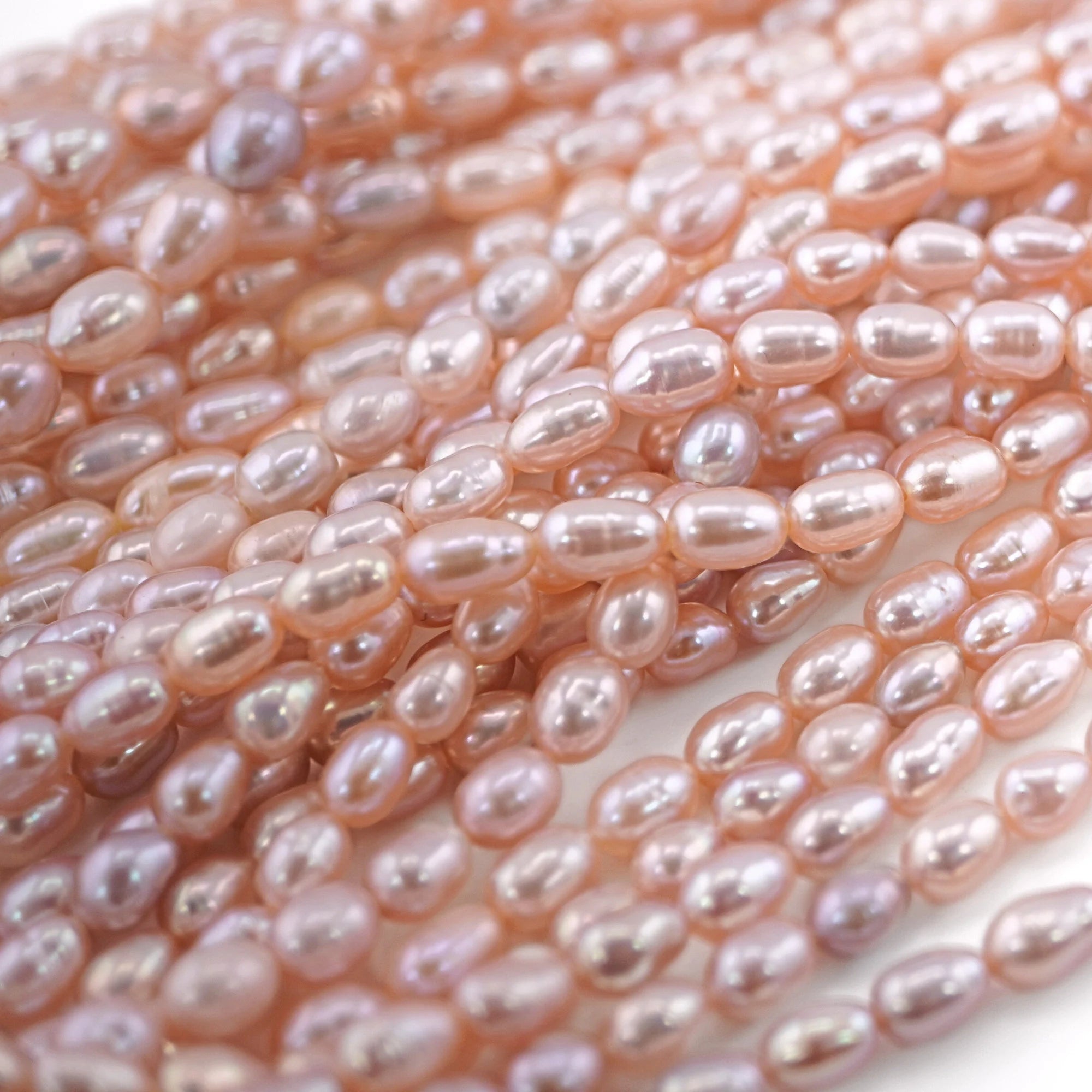 Peach Rice Oval Shape Freshwater Pearls Beads