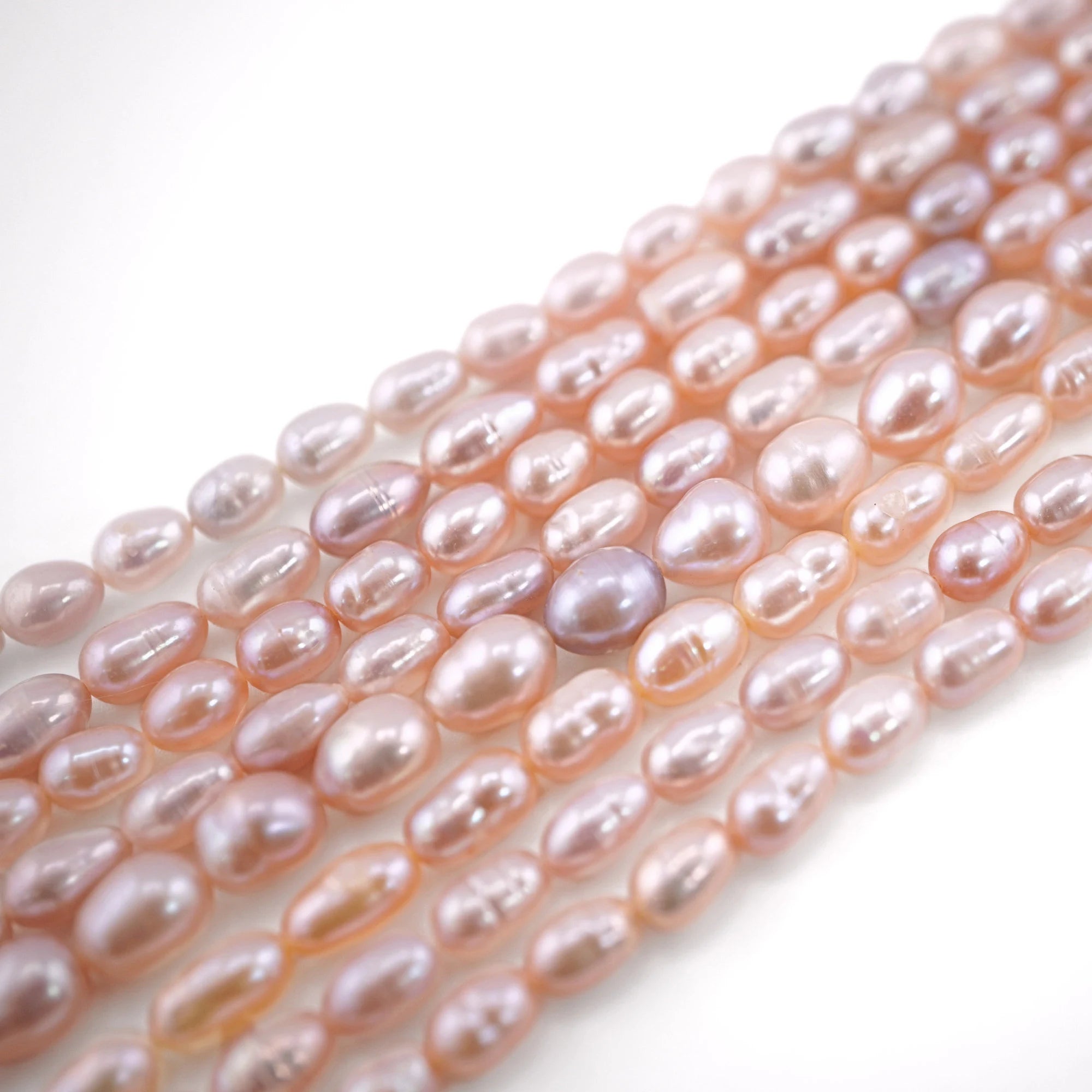 Peach Rice Oval Shape Freshwater Pearls Beads