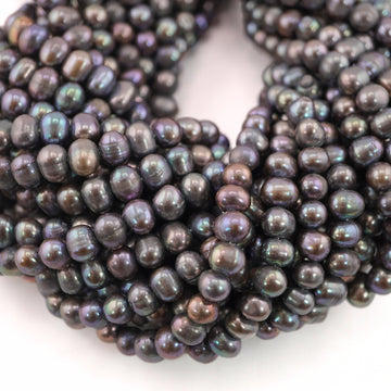 glossy cultured pearl strands