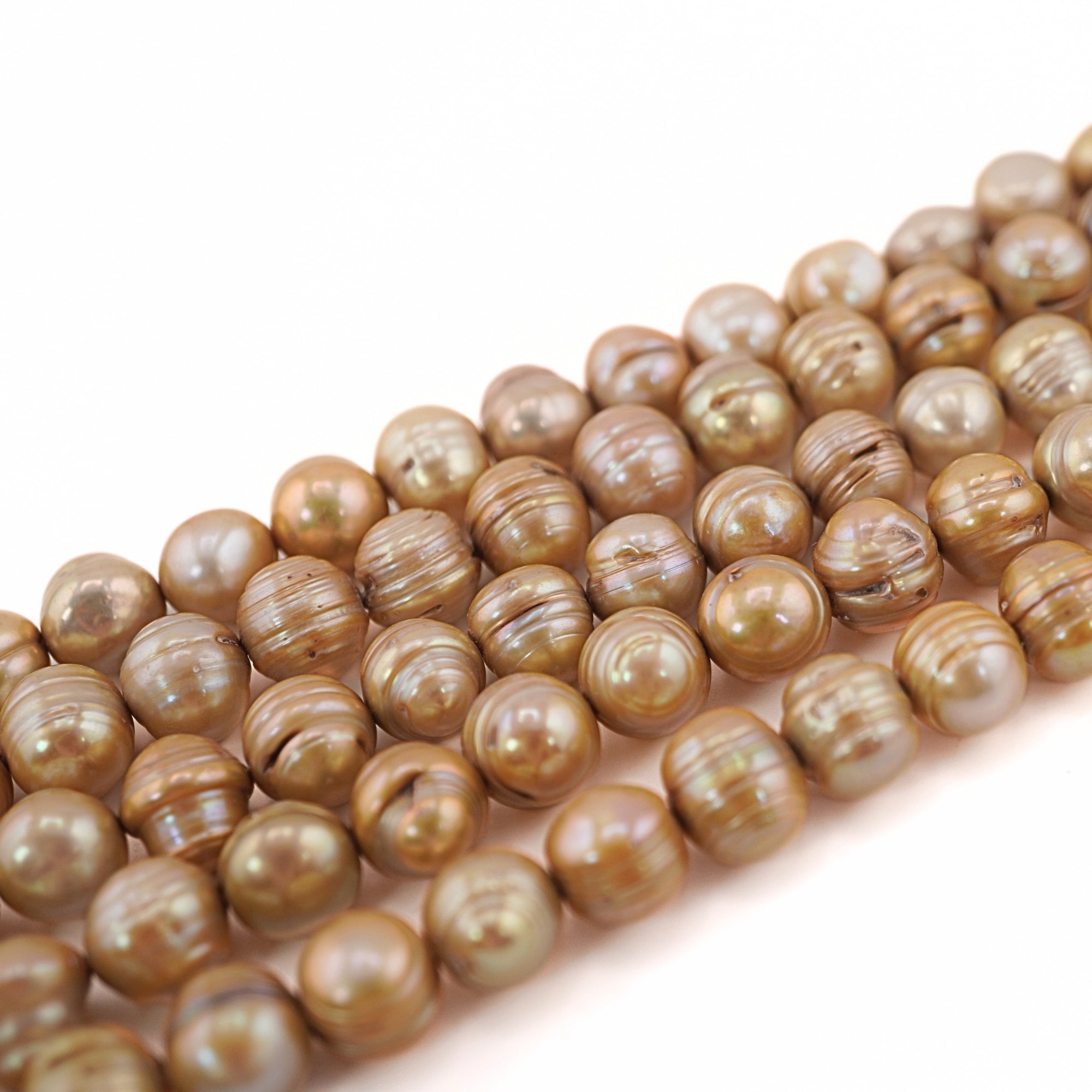 golden near round natural pearls