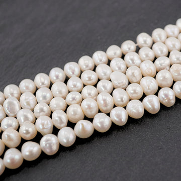 lustrous near-round pearls
