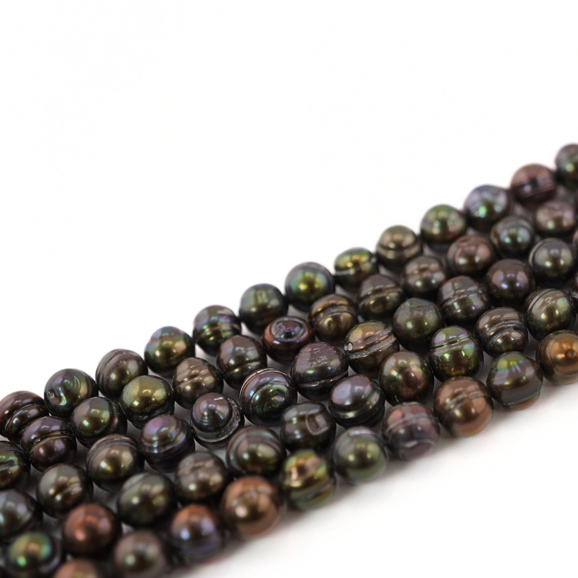 tiny peacock pearls strand
