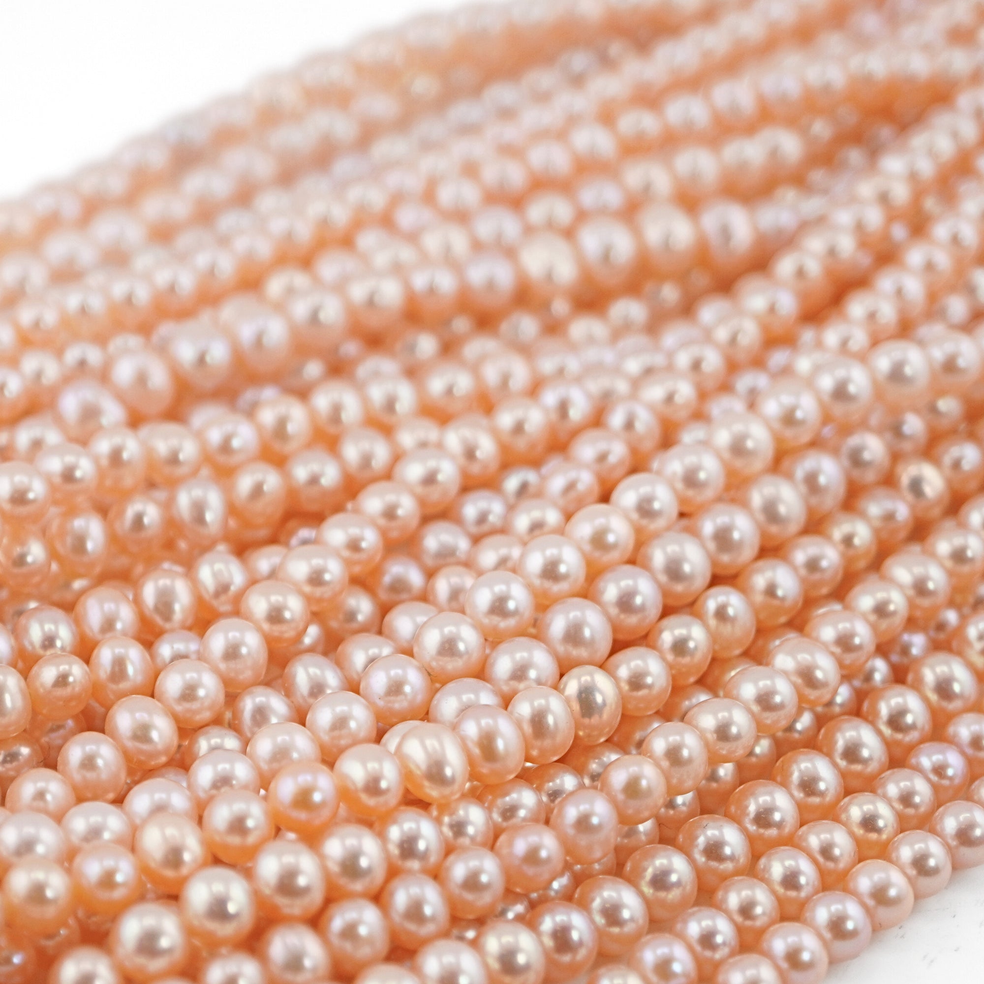 6-4mm peach pearl beads

