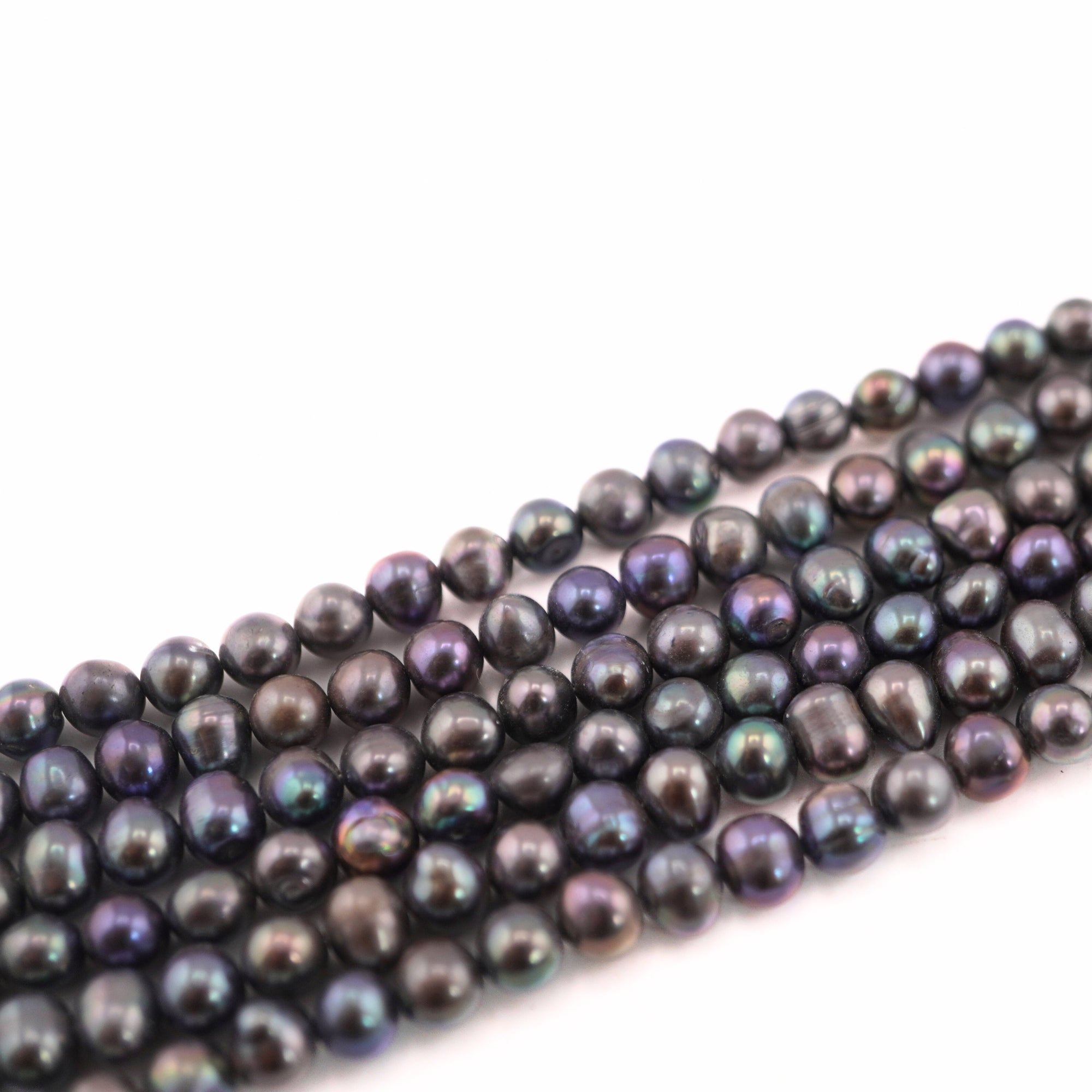 Close-up of peacock potato pearls for handmade jewelry

