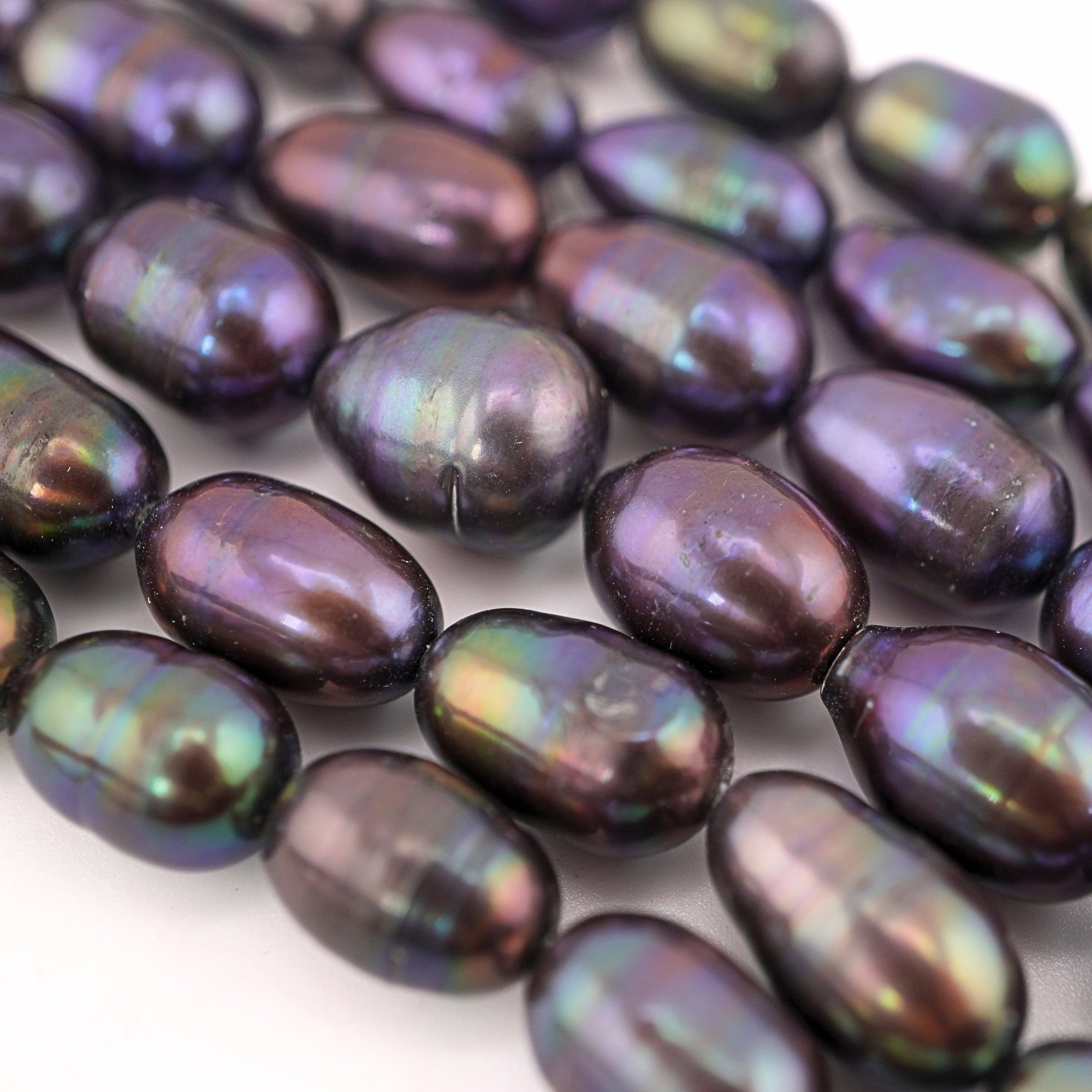 14 x 8 - 9 x 6 MM Peacock Rice Freshwater Pearls Beads