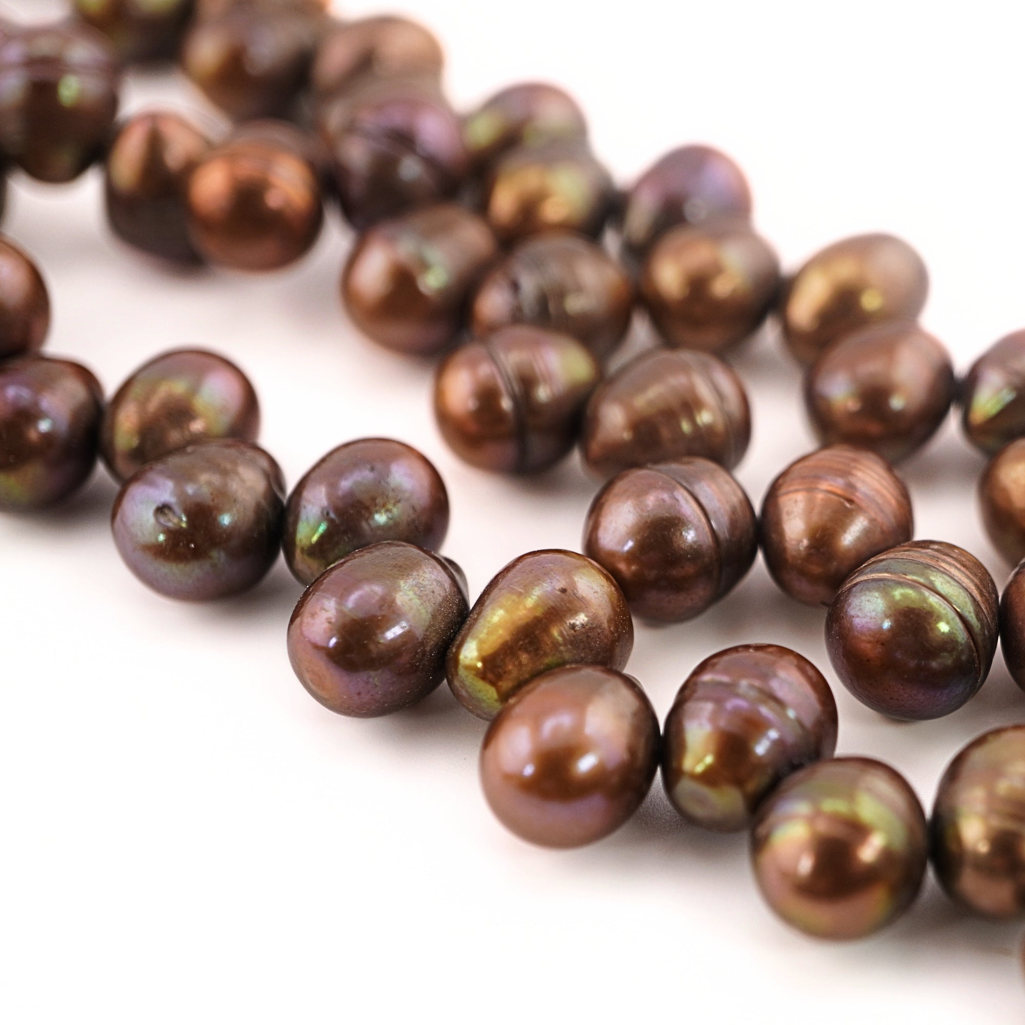 11 x 9 - 15 x 9 MM Golden Oval Freshwater Pearls Beads