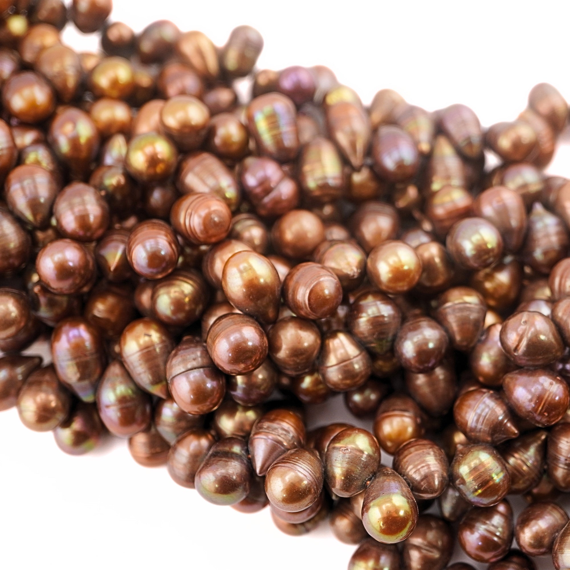 14 x 9 - 11 x 9 MM Golden Oval Freshwater Pearls Beads