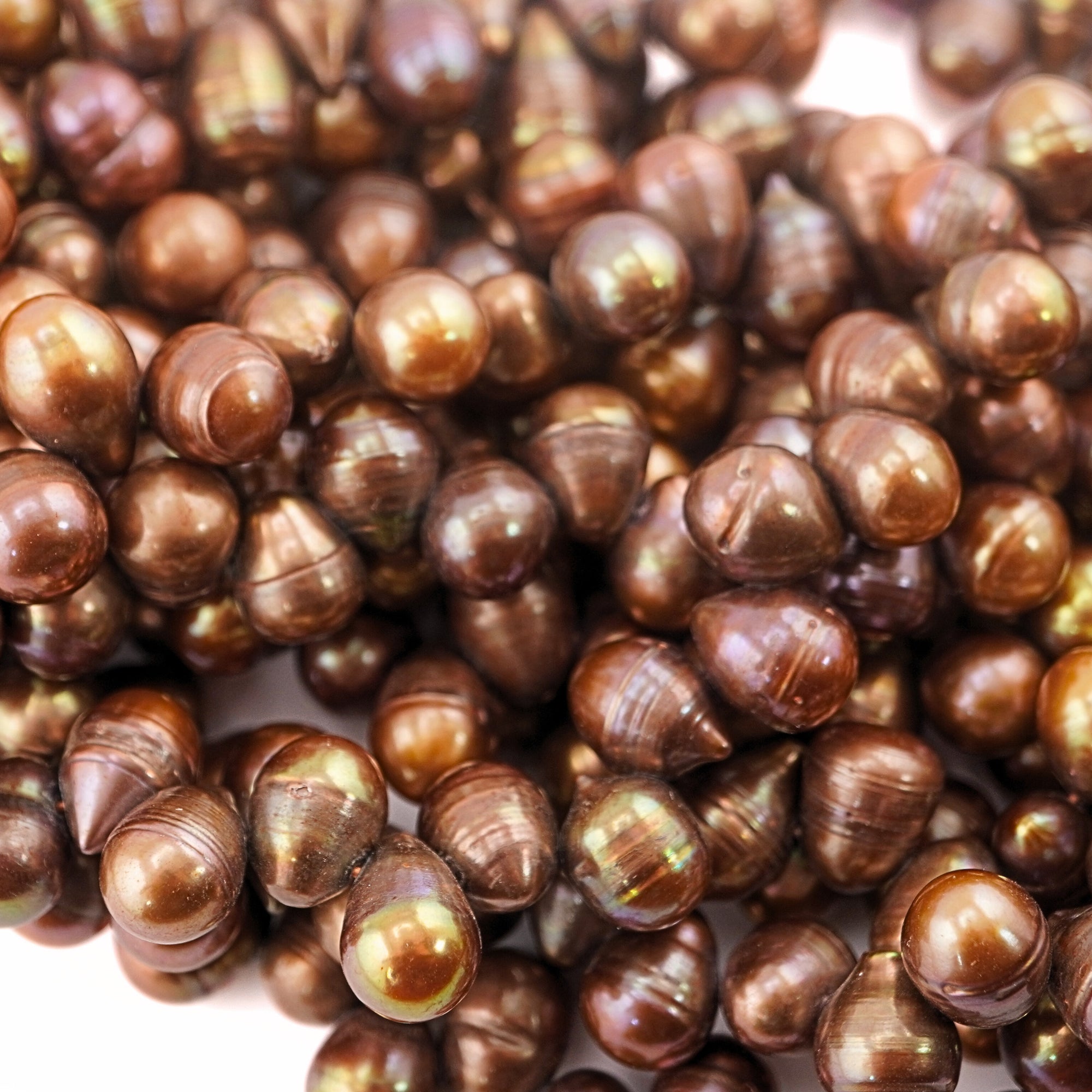 14 x 9 - 11 x 9 MM Golden Oval Freshwater Pearls Beads