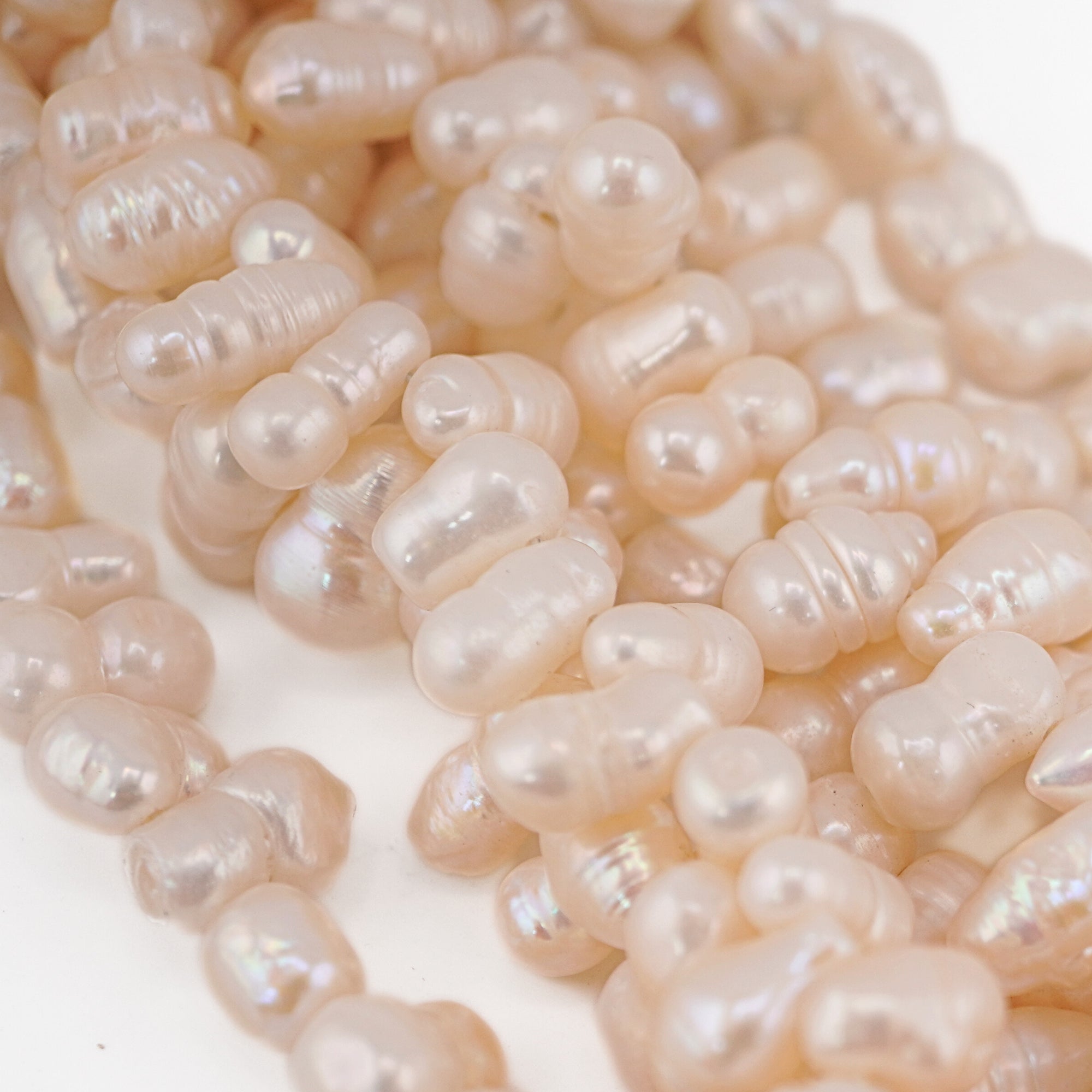 9 x 5 MM White Oval Freshwater Pearls Beads