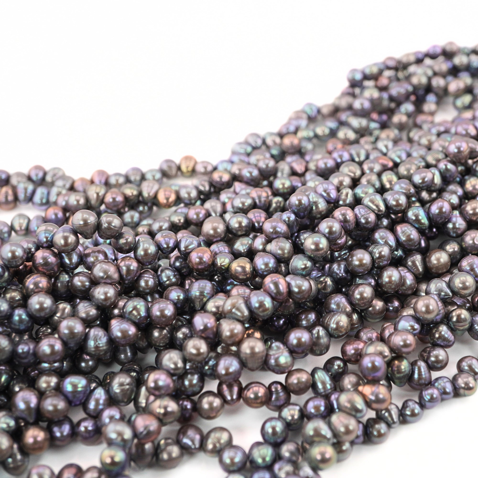 7 x 5 - 6 x 5 MM Peacock Oval Freshwater Pearls Beads