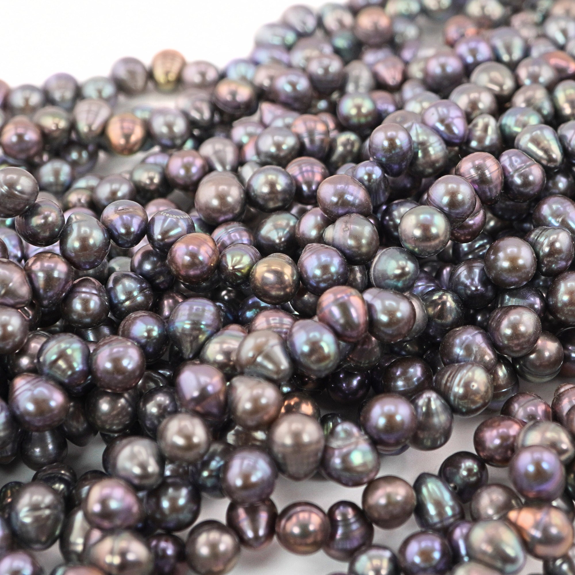 7 x 5 - 6 x 5 MM Peacock Oval Freshwater Pearls Beads