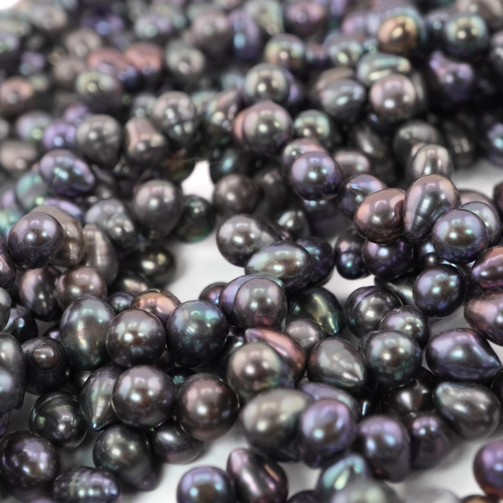 9 x 6 - 8 x 6 MM Peacock Oval Freshwater Pearls Beads