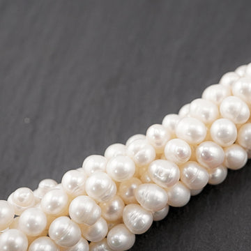 8 x 6 - 7 x 6 White Oval Freshwater Pearls Beads