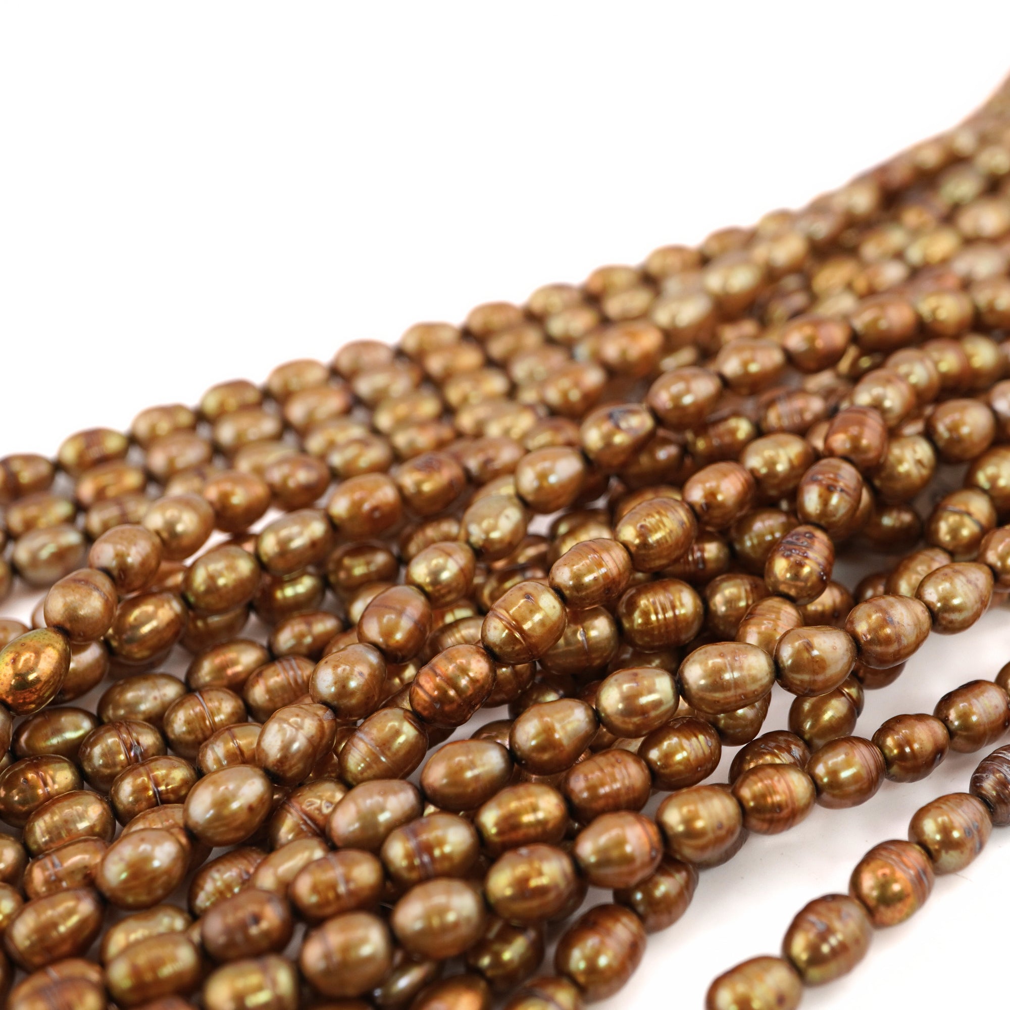 8 x 6 - 7 x 6 MM Golden Oval Freshwater Pearls Beads