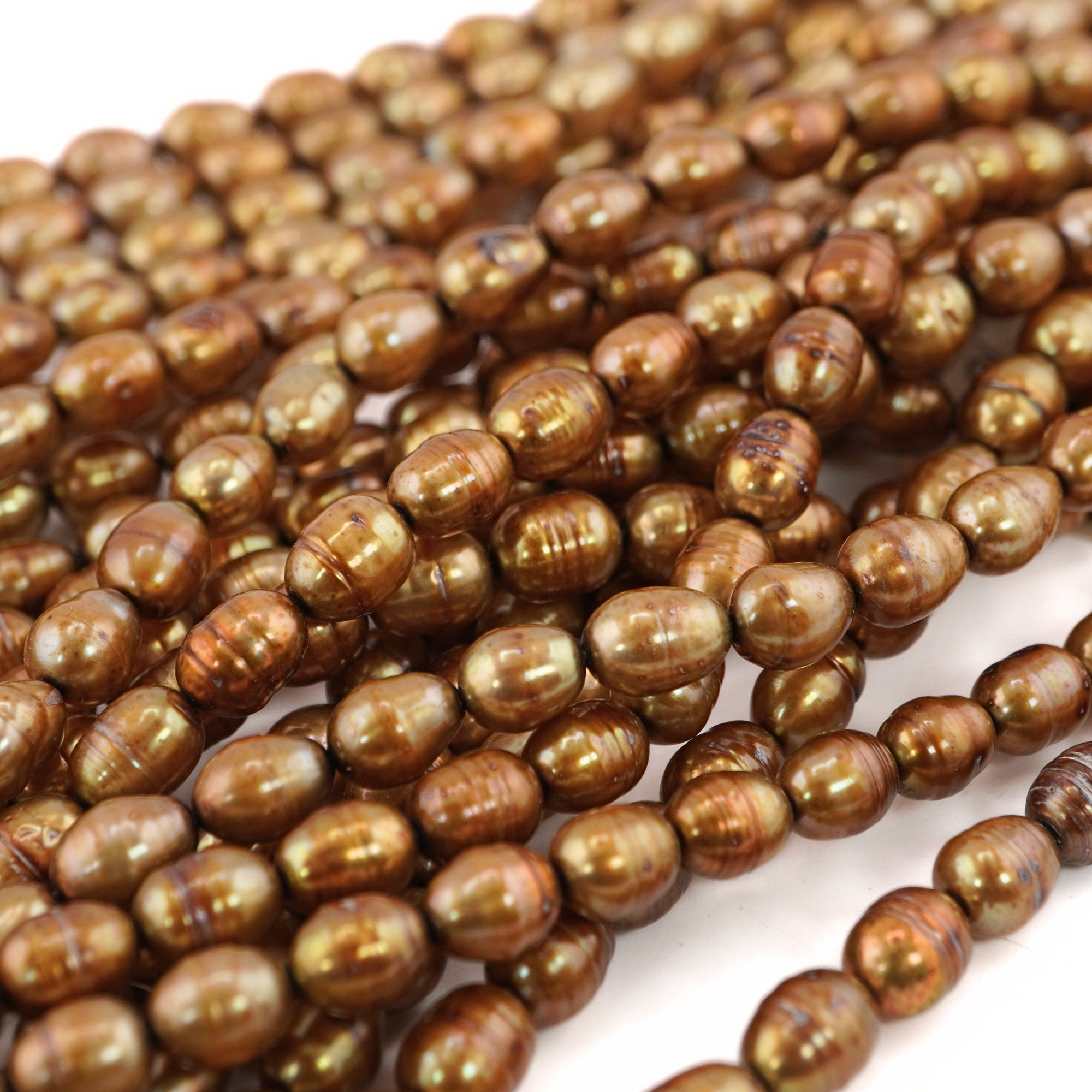 8 x 6 - 7 x 6 MM Golden Oval Freshwater Pearls Beads
