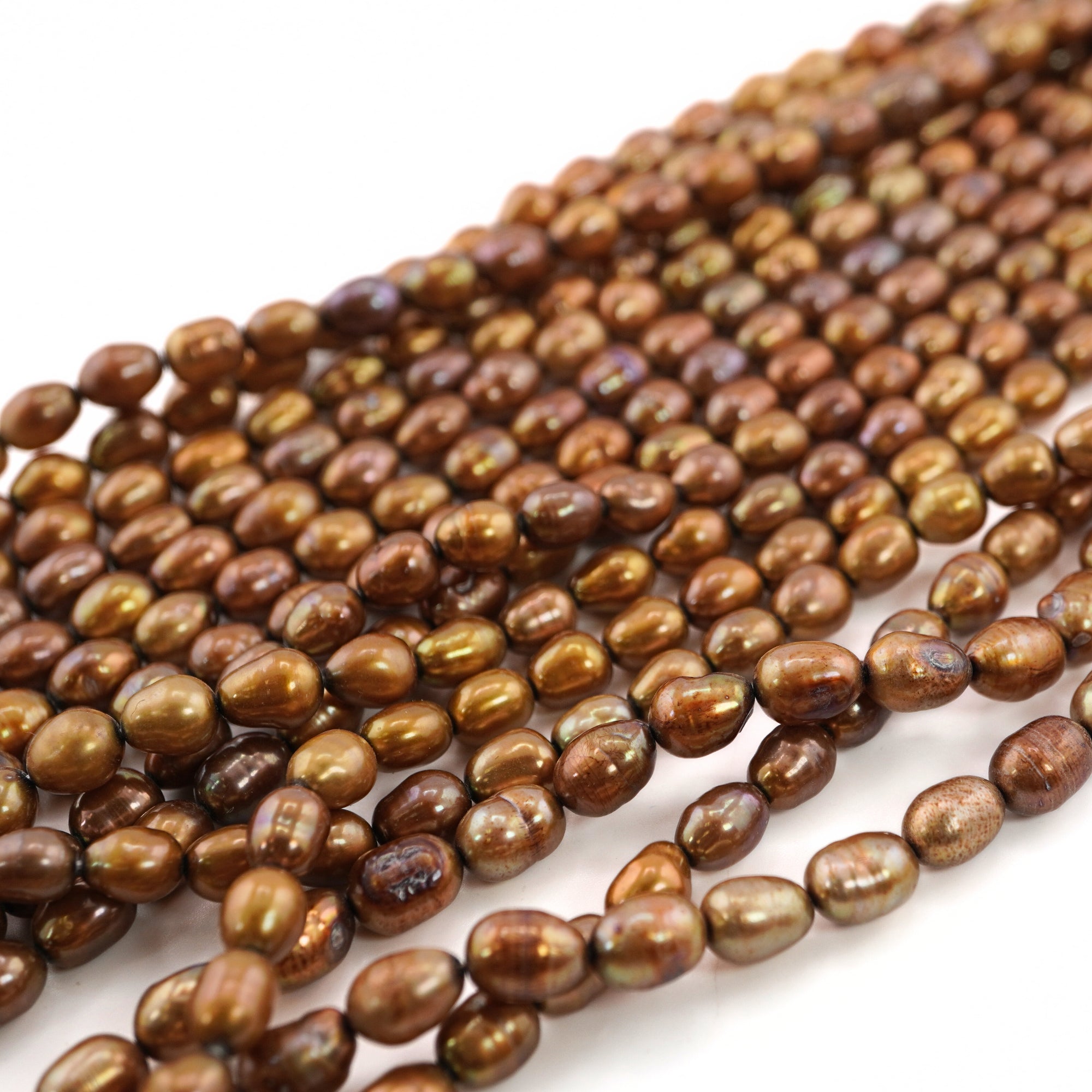 6 x 4 - 5 x 4 MM Golden Oval Freshwater Pearls Beads