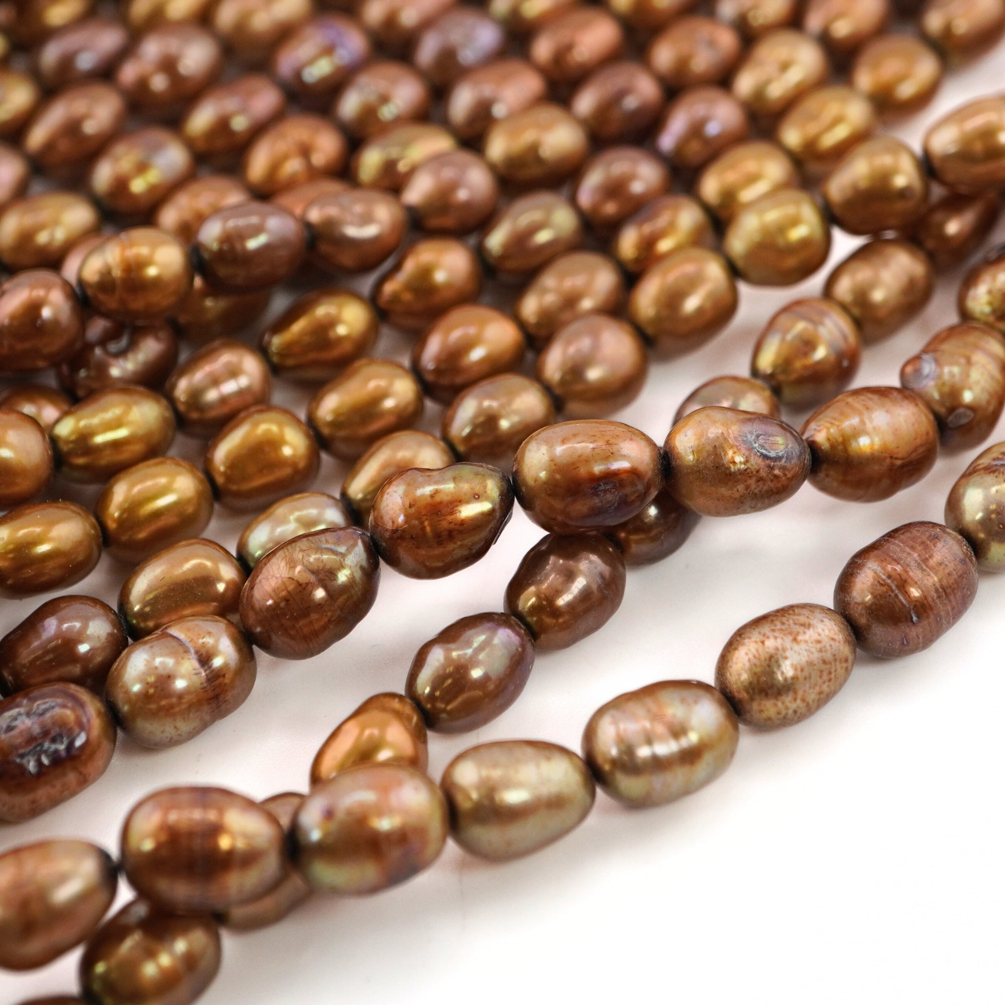 6 x 4 - 5 x 4 MM Golden Oval Freshwater Pearls Beads