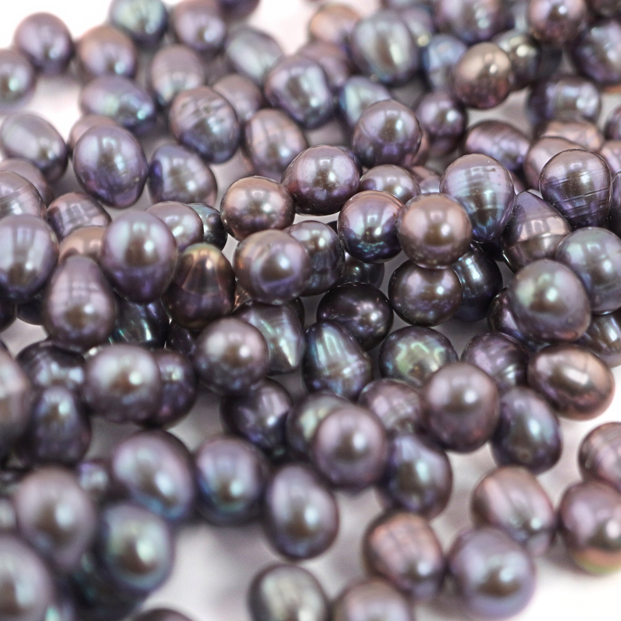 10 x 7 - 8 x 7 MM Peacock Oval Freshwater Pearls Beads