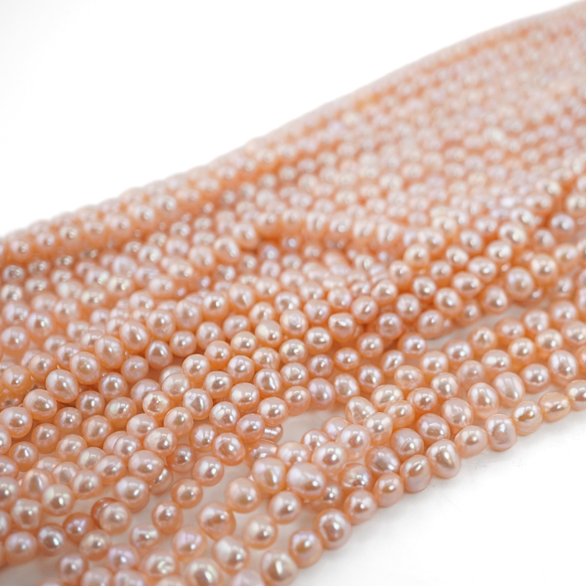 6 x 5 MM Peach Oval Freshwater Pearls Beads