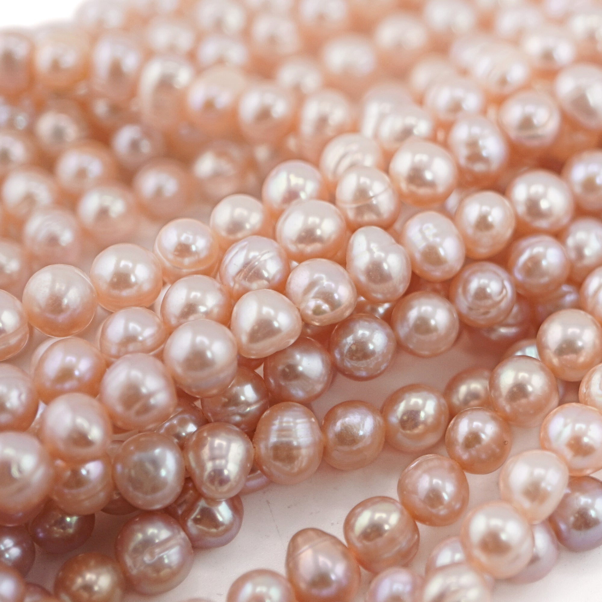 6 x 5 - 5 MM Peach Oval Freshwater Pearls Beads
