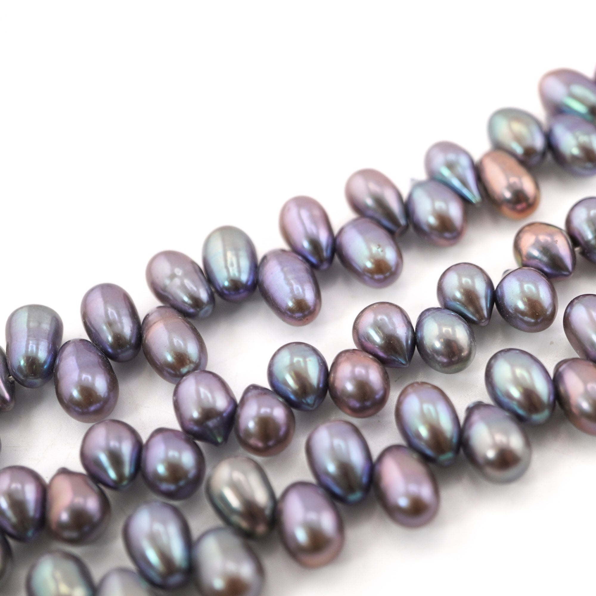 10 x 7 - 8 x 7 MM Peacock Oval Freshwater Pearls Beads