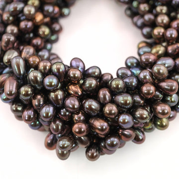 10 x 5 - 7 x 5 MM Peacock Oval Freshwater Pearls Beads