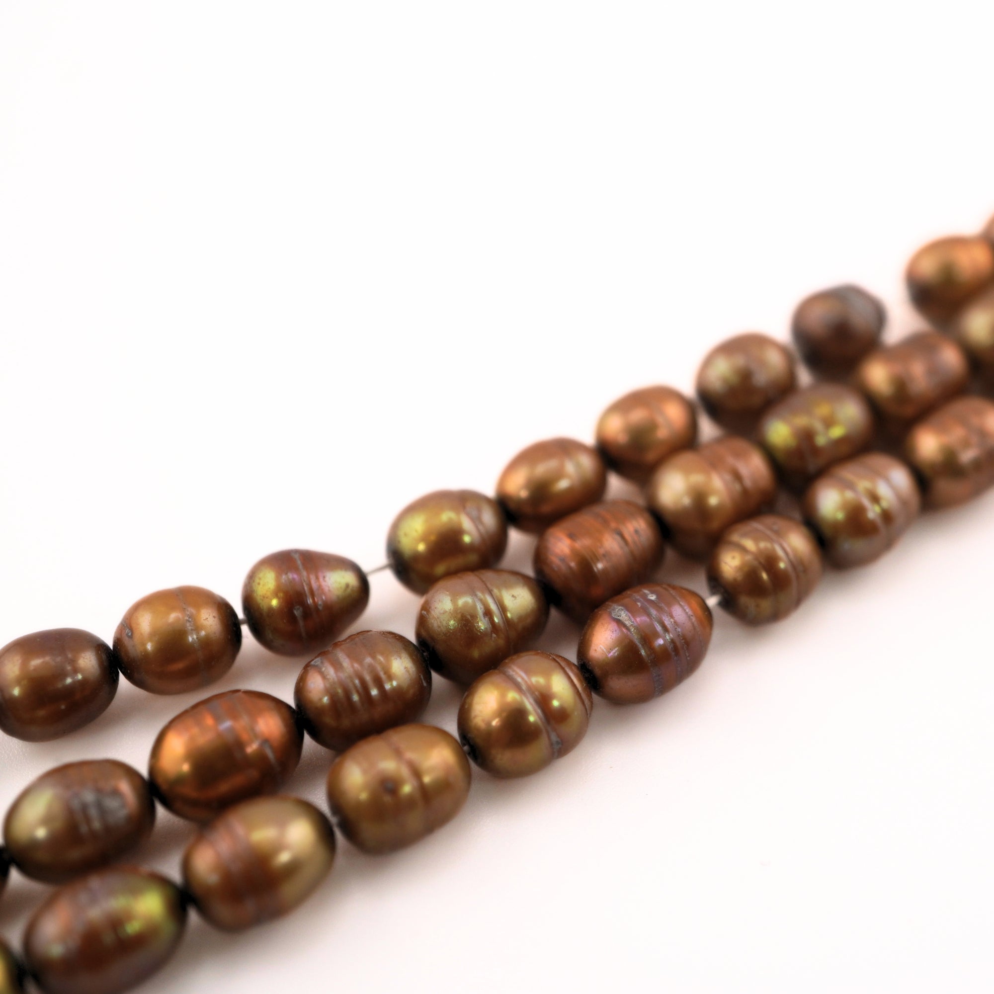 Gold rice shape pearl strand


