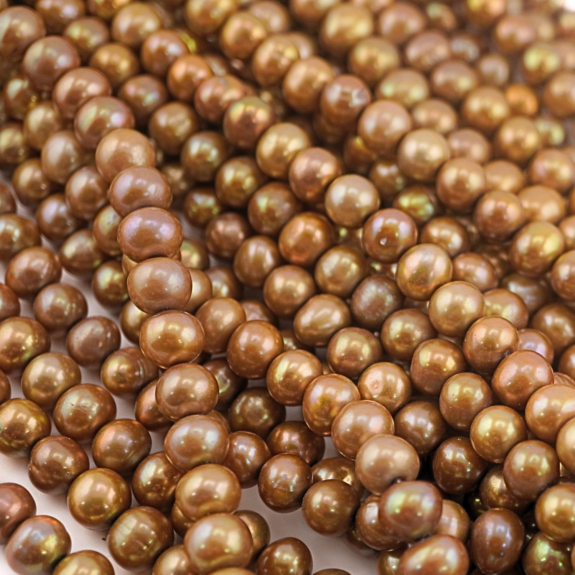 Golden near round freshwater pearls beads

