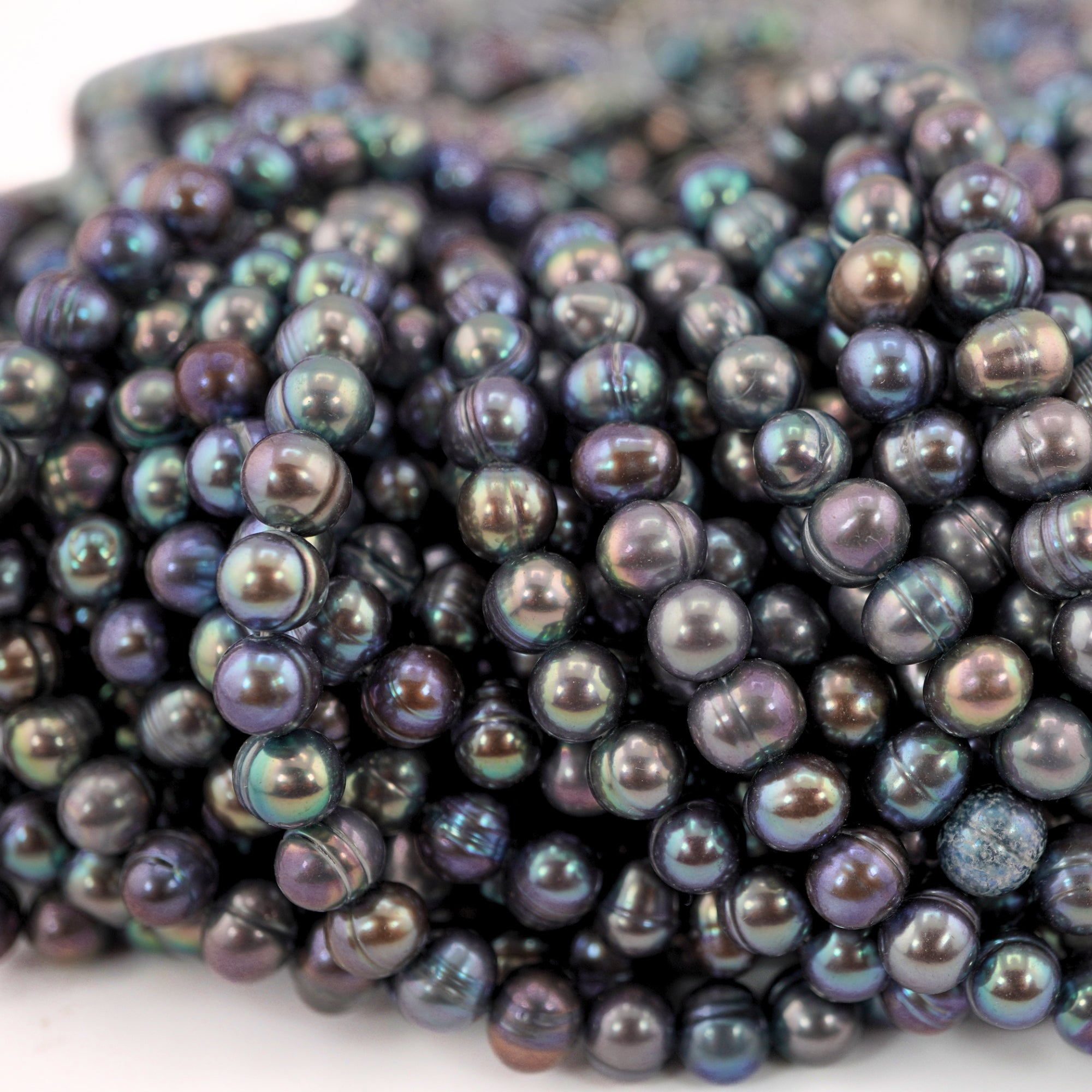 Iridescent Freshwater Pearl Strands Close-up

