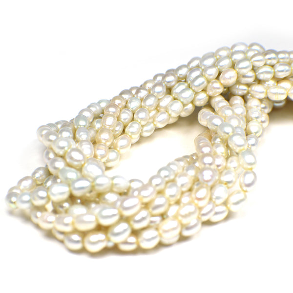 5x4 - 6x4 MM Light Green Rice Freshwater Pearls Beads