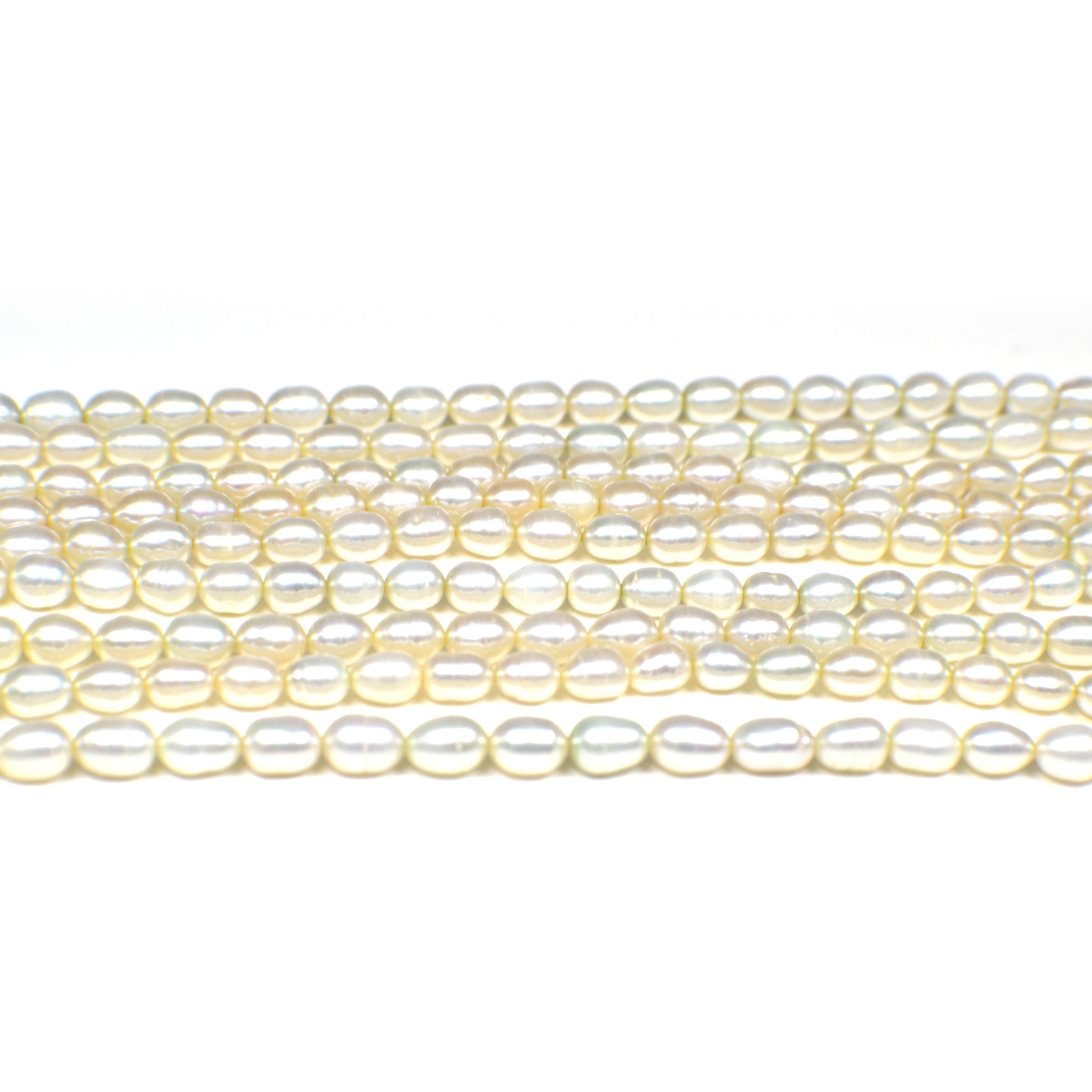 5x4 - 6x4 MM Light Green Rice Freshwater Pearls Beads