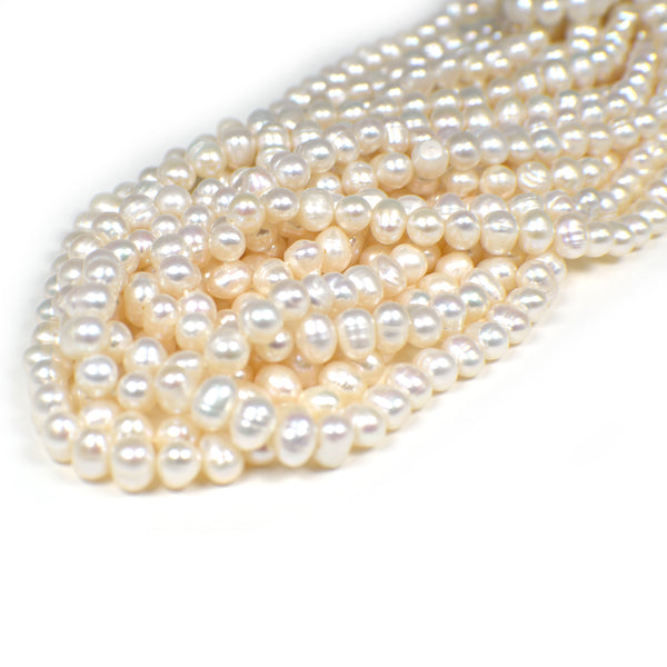 8x6 - 9x6 MM White Rice / Oval Freshwater Pearls Beads
