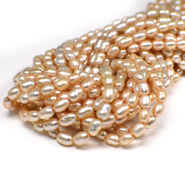 6x4 - 7x4 Light Peach Rice Freshwater Pearls Beads