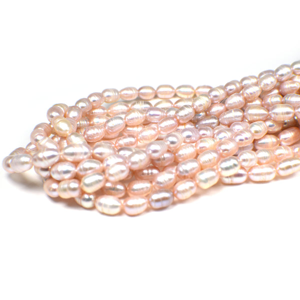 6x4 - 8x5 MM Pink Peach Ringed Rice Freshwater Pearls Beads