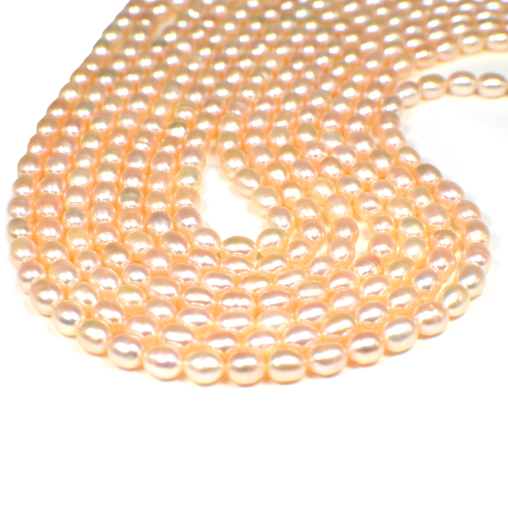 6x4 - 6x5 MM Pink Peach Rice Freshwater Pearls Beads
