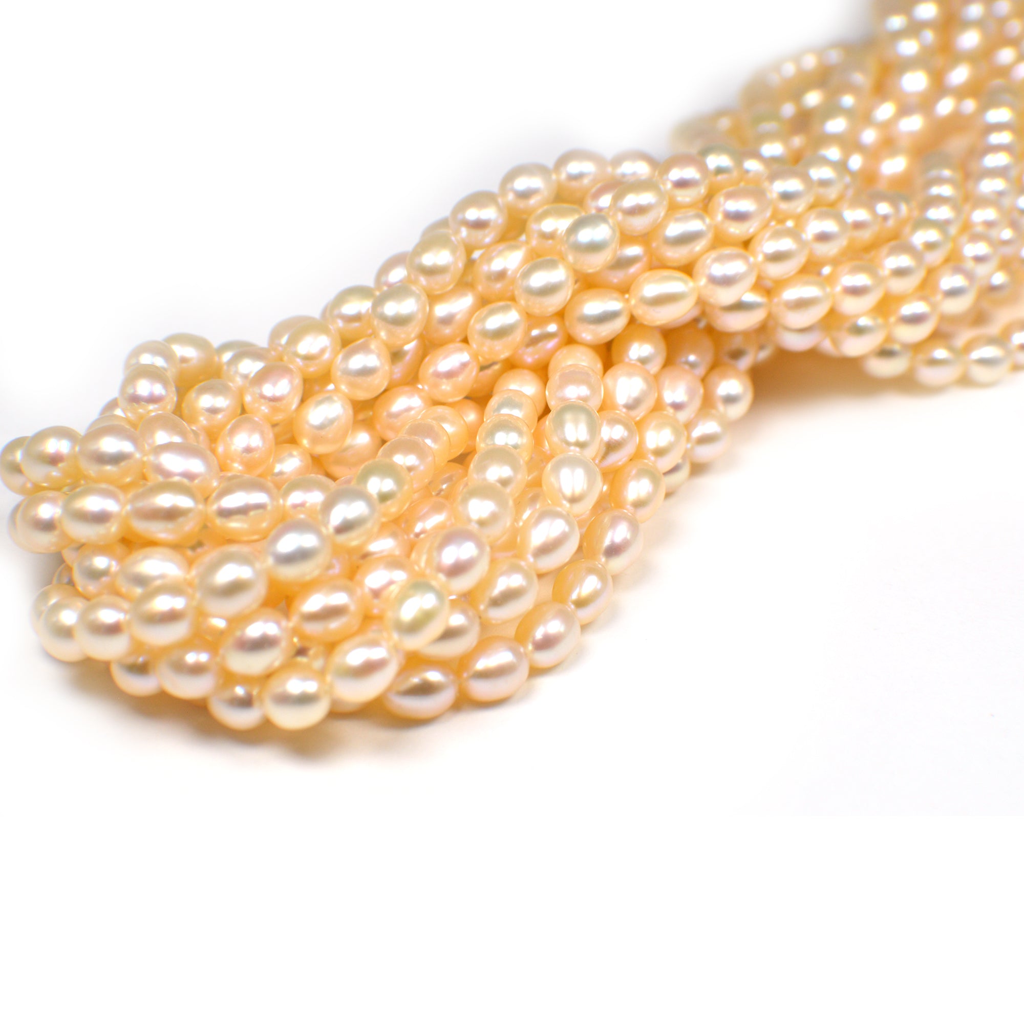 6x5 - 6.5x5.5 MM Peach Rice Freshwater Pearls Beads