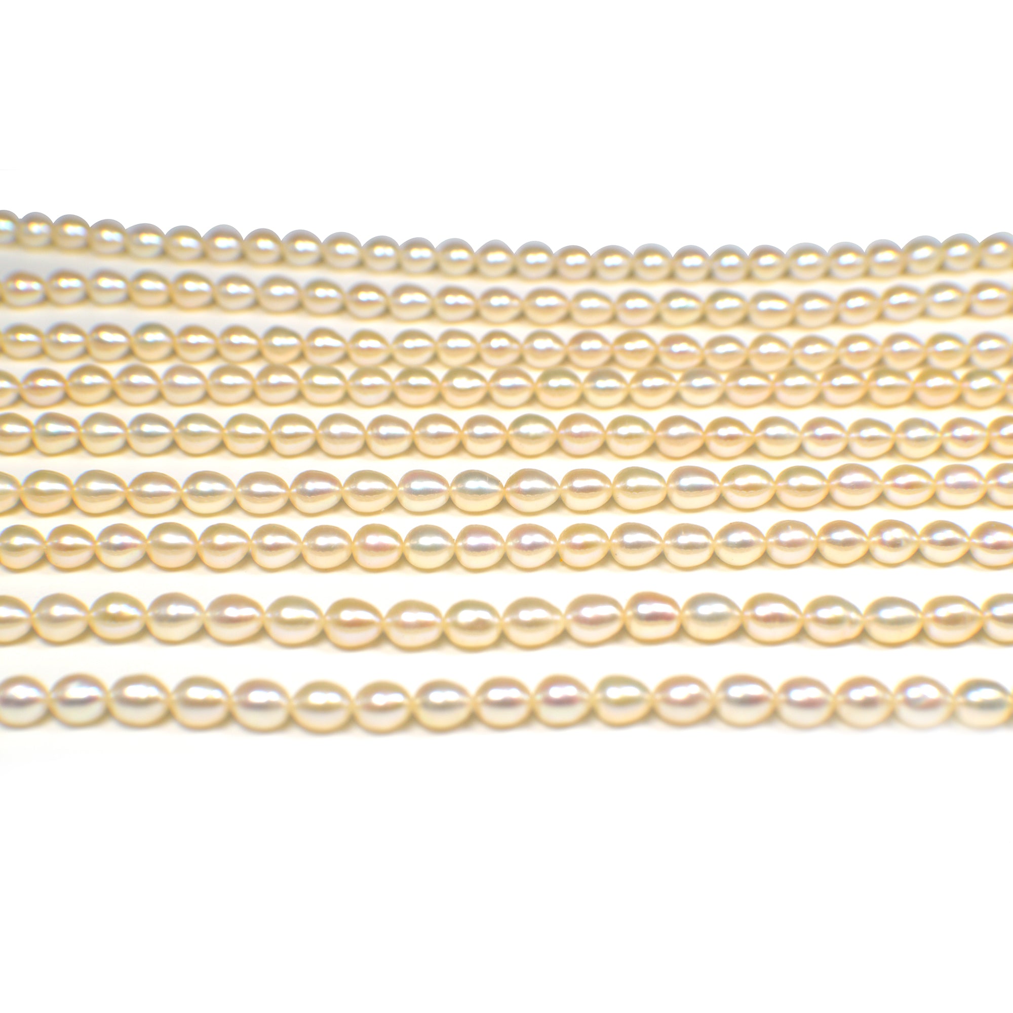 6x5 - 6.5x5.5 MM Peach Rice Freshwater Pearls Beads