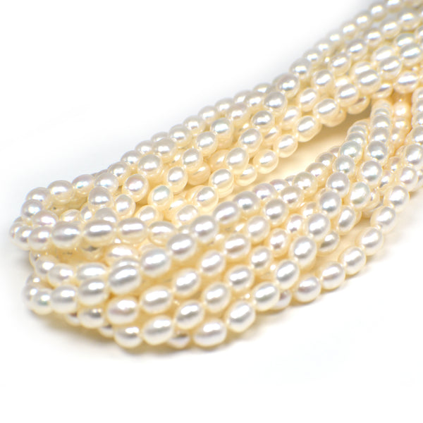 6x4 - 6x5 MM White Rice Freshwater Pearls Beads