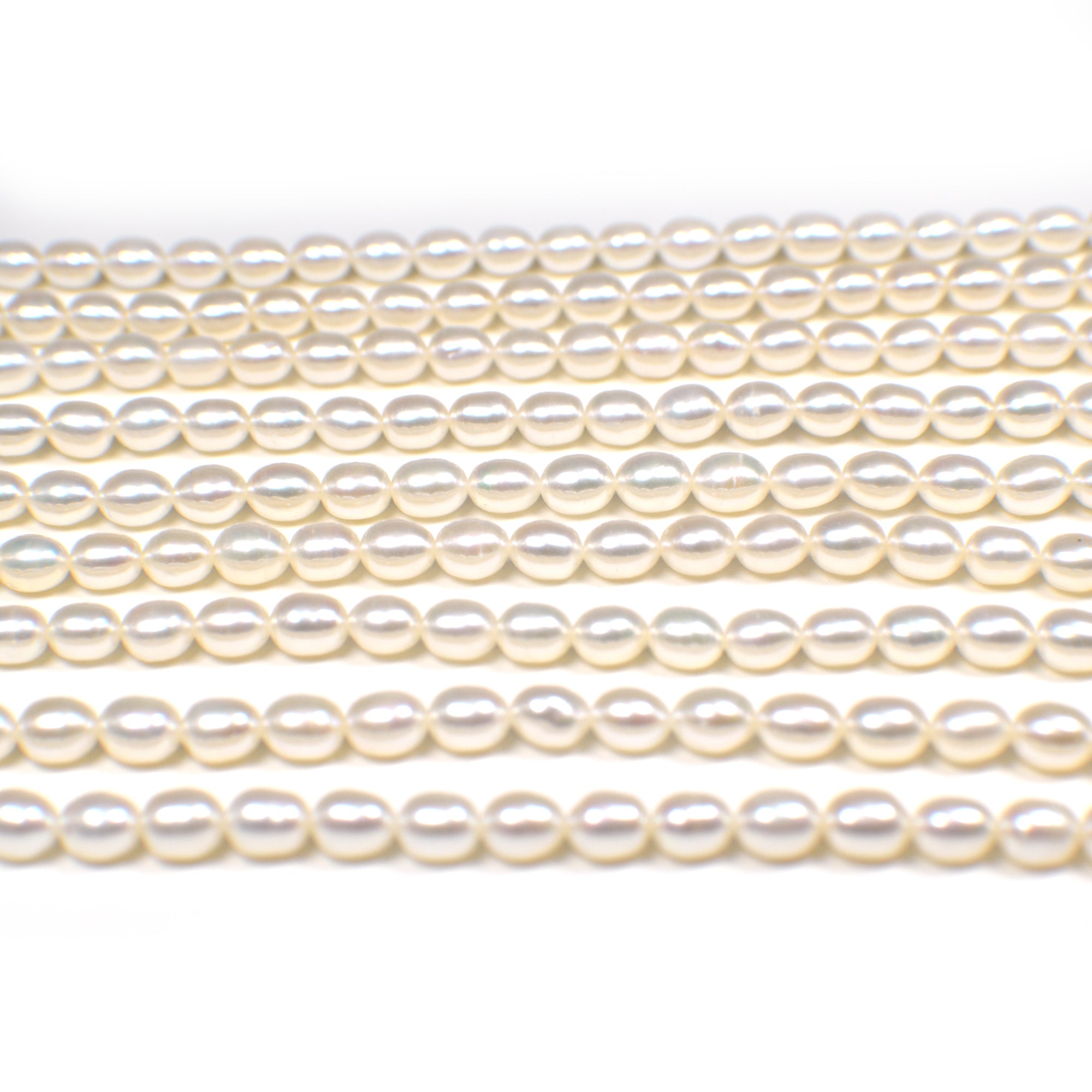 6x4 - 6x5 MM White Rice Freshwater Pearls Beads