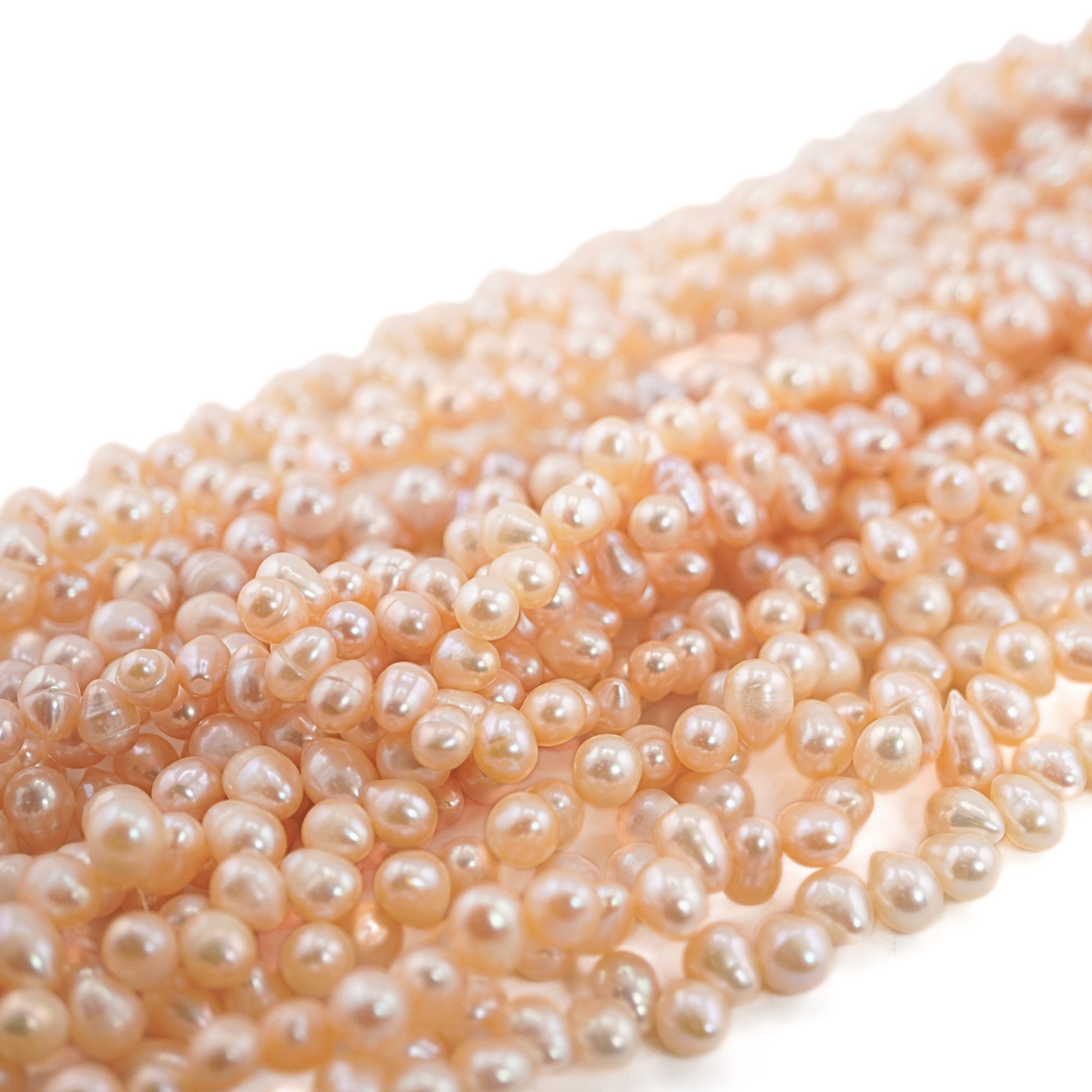 Jewelry supplies peach pearls

