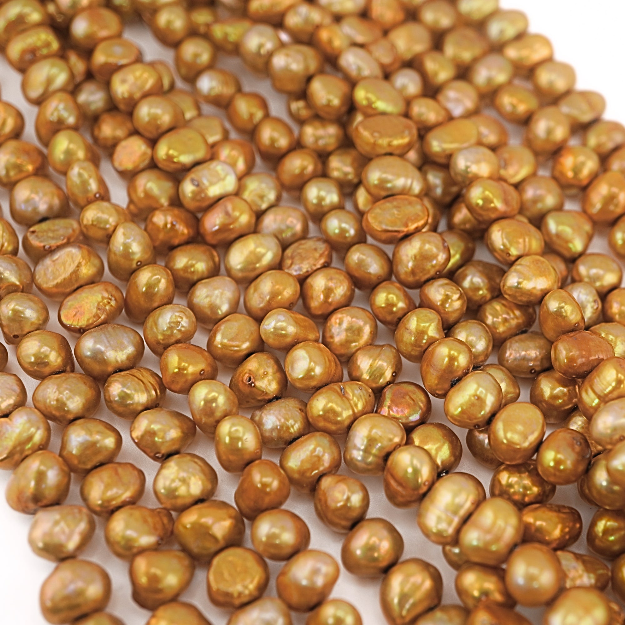 Metallic gold baroque pearls for jewelry

