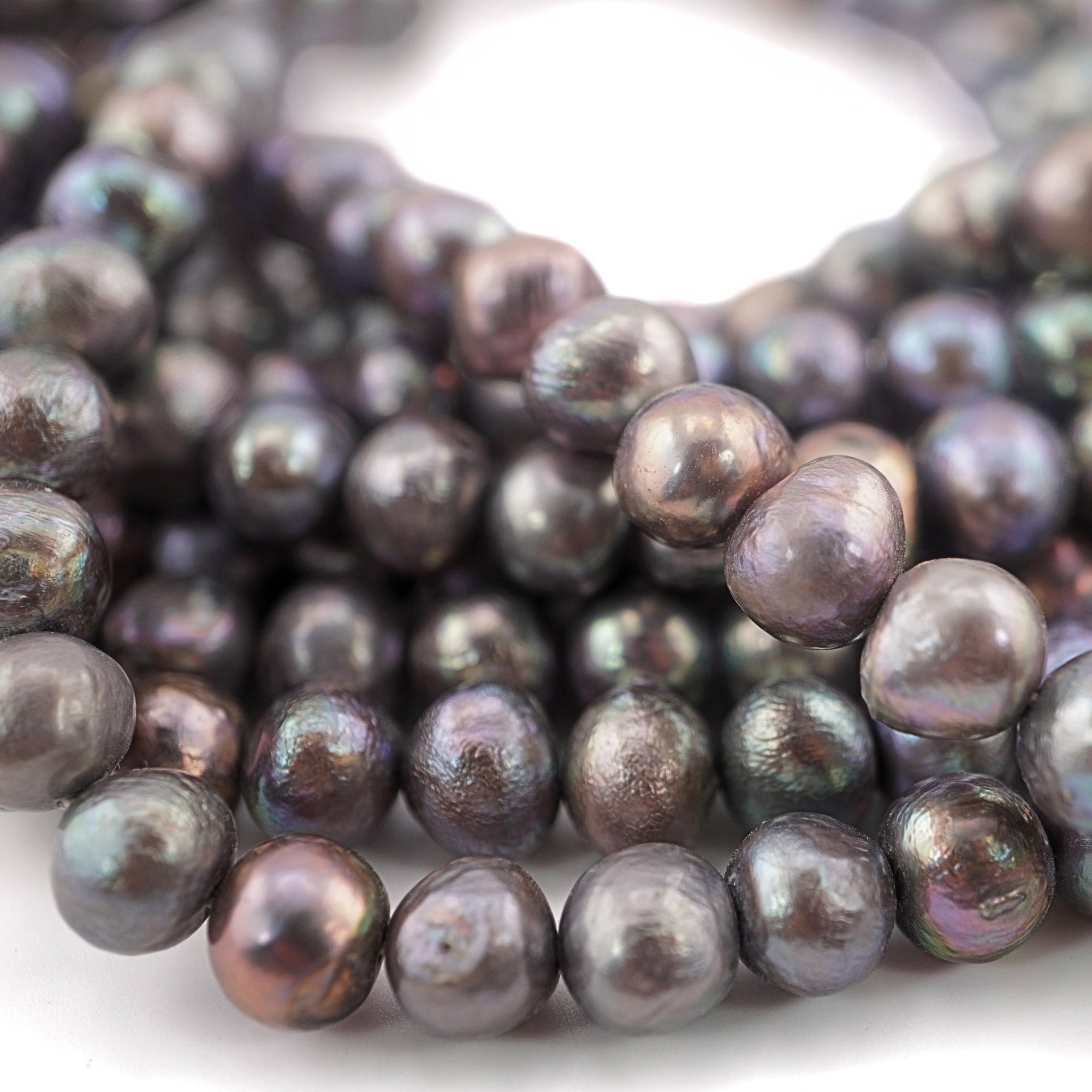 Natural Freshwater Plum Pearls

