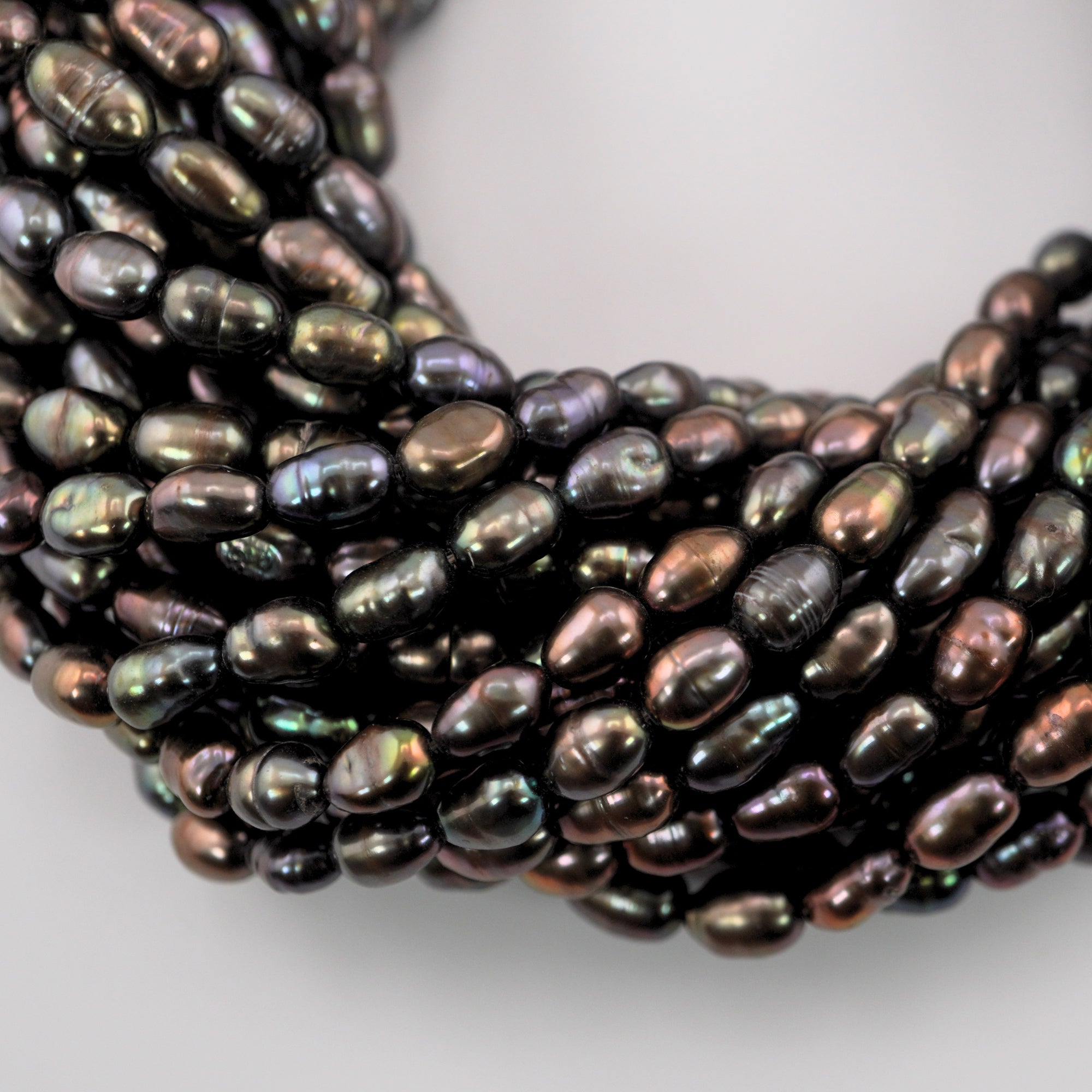 Natural oval peacock pearls

