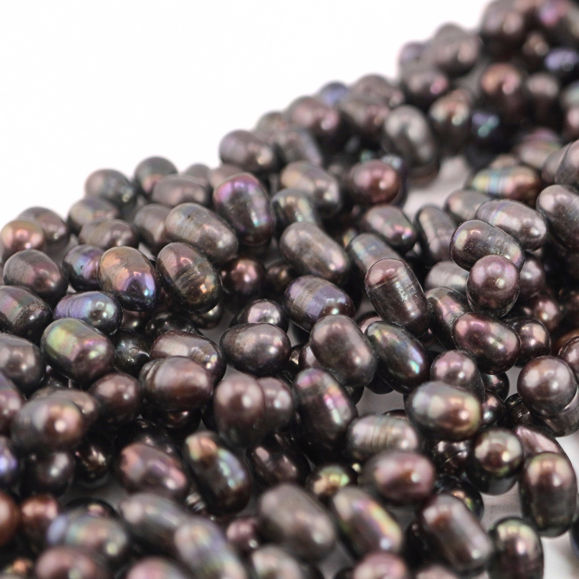 Oval shaped freshwater pearls peacock

