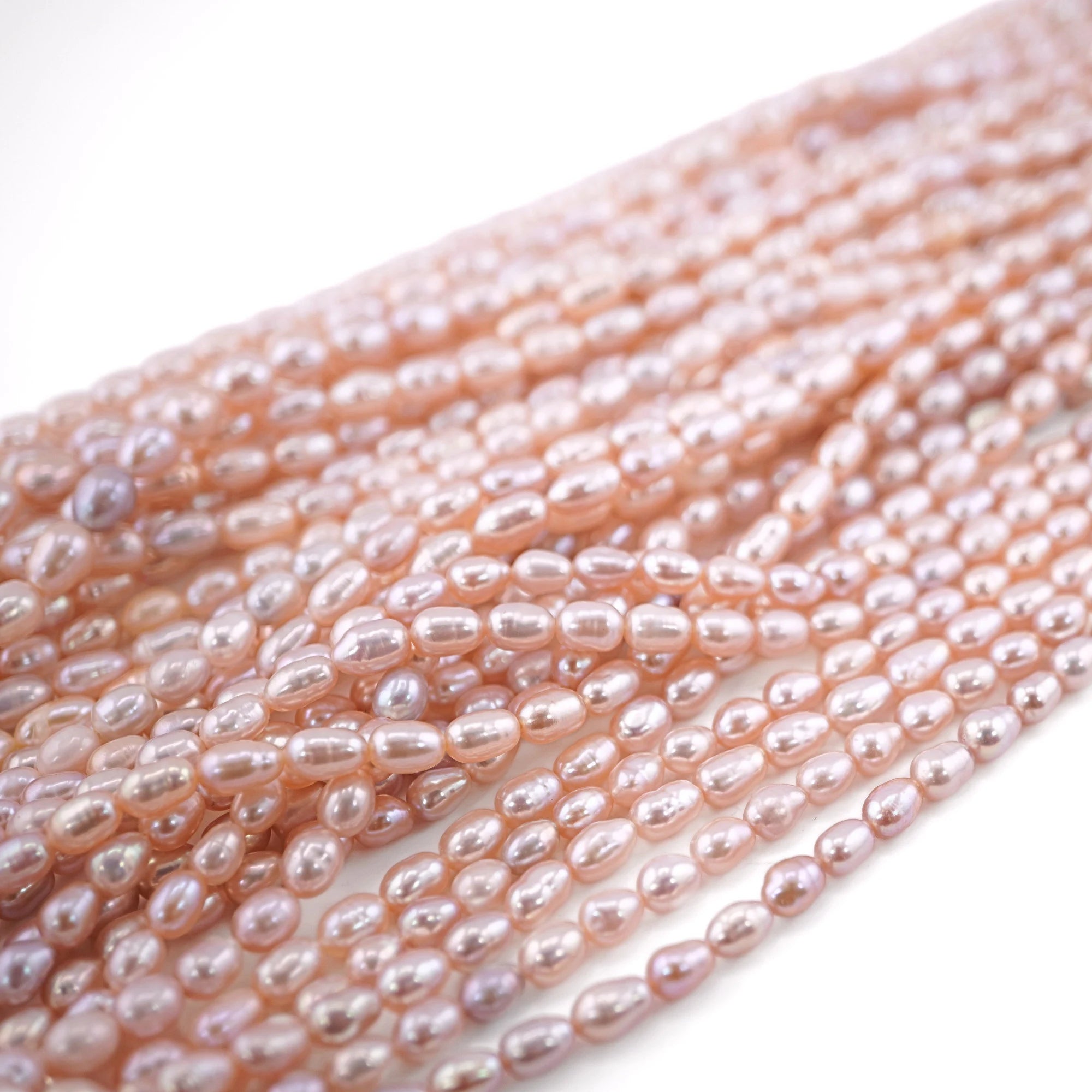 Peach Rice  Oval Shape Freshwater Pearls Beads 