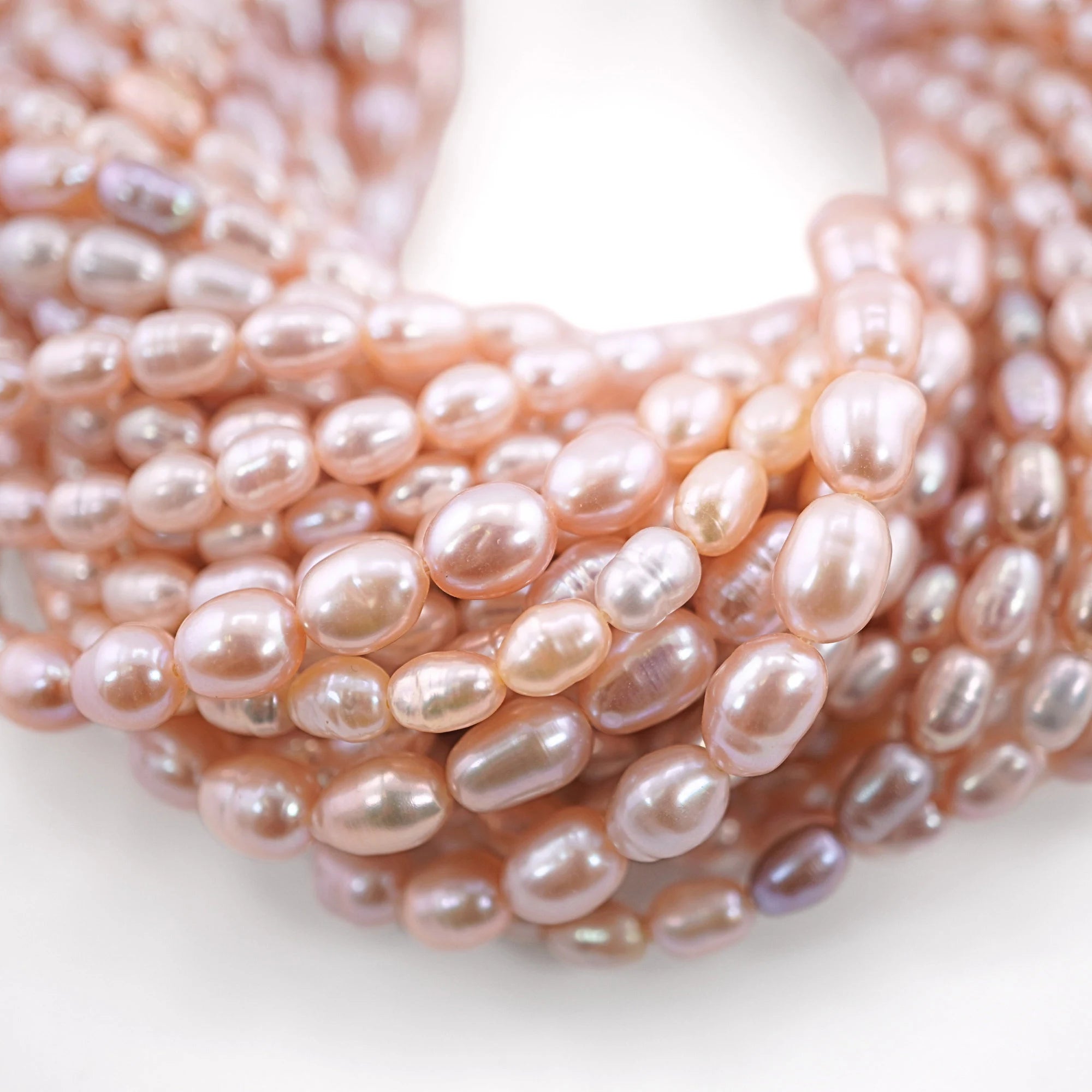 Peach Rice  Oval Shape Freshwater Pearls Beads 