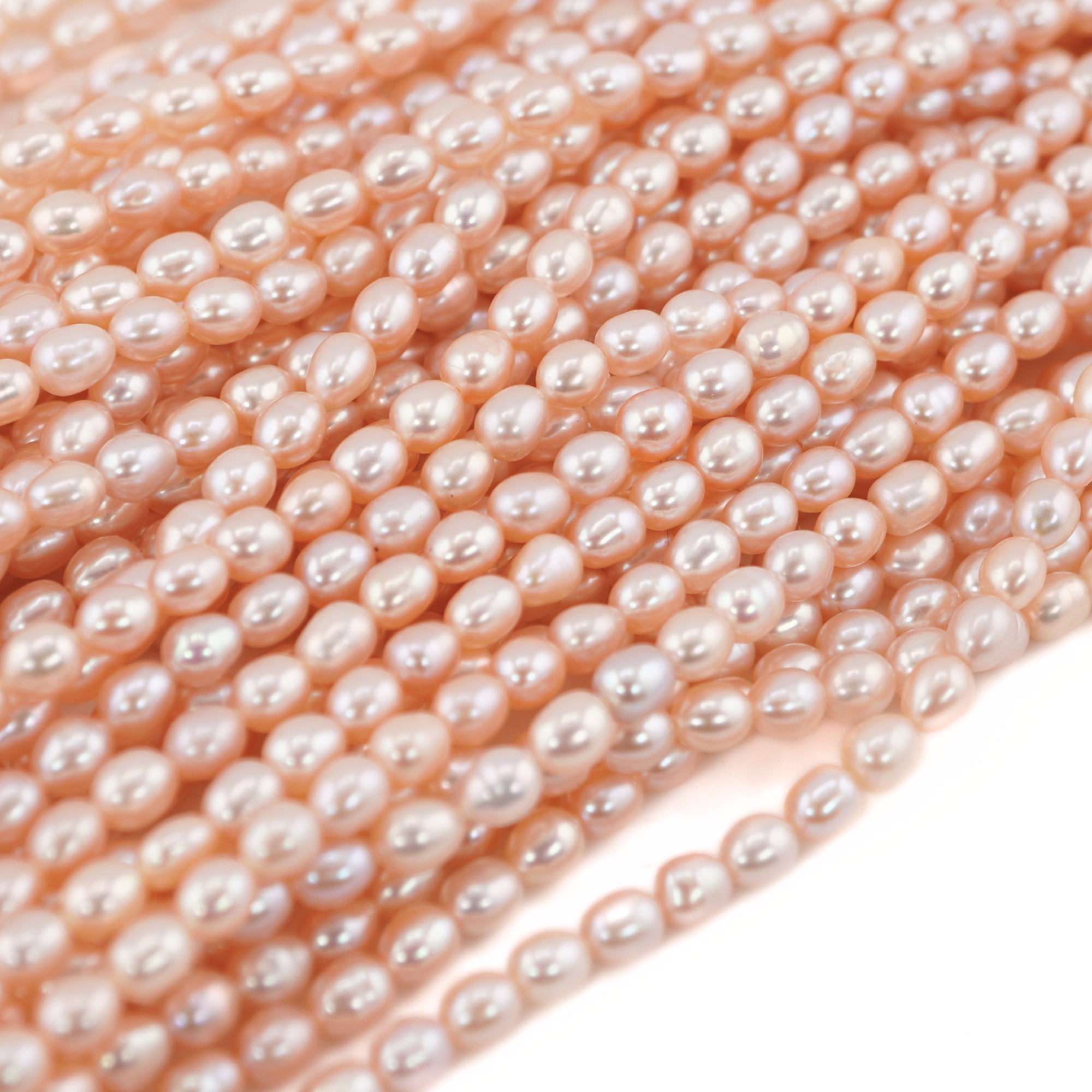 Peach oval freshwater pearls for jewelry

