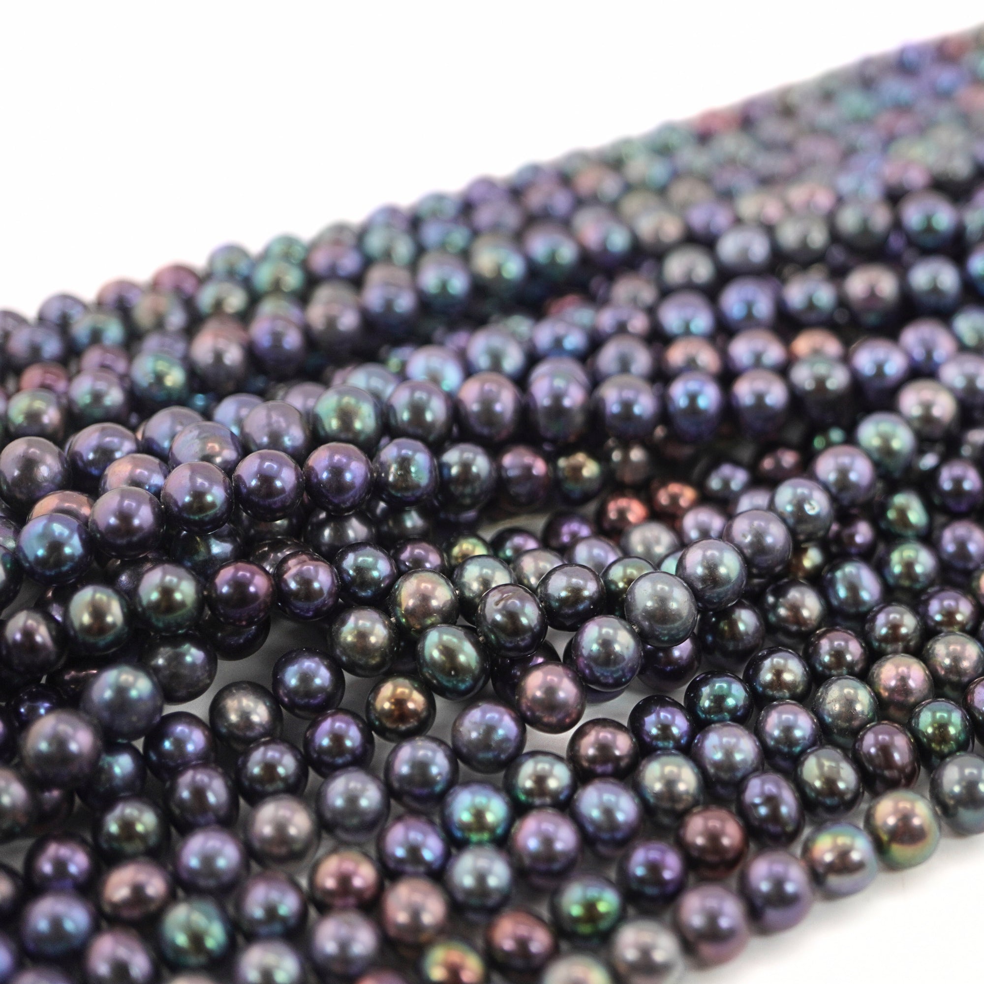 Round Navy Blue Pearl Strands

